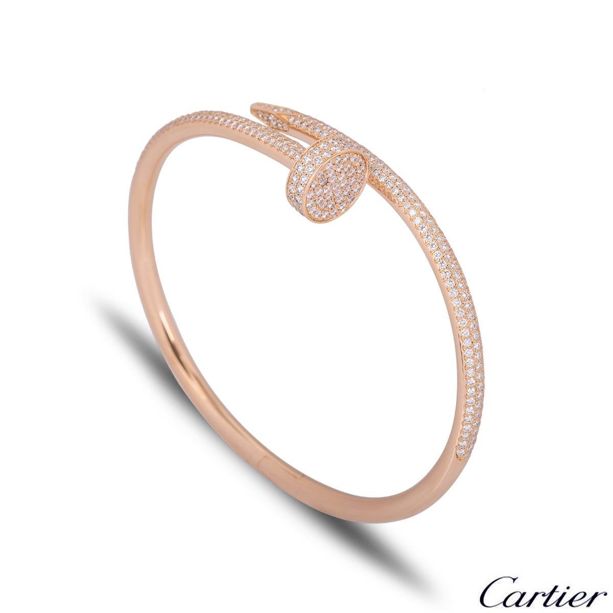 A stunning 18k rose gold diamond bangle by Cartier from the Juste Un Clou collection. The bangle is of a nail design, fully pave set around the outer side with 374 round brilliant cut diamonds totalling 2.26ct. The bangle measures 3.5mm at the