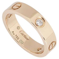 Cartier Anello d'amore con mezzo diamante in oro rosa misura 54 B4087500