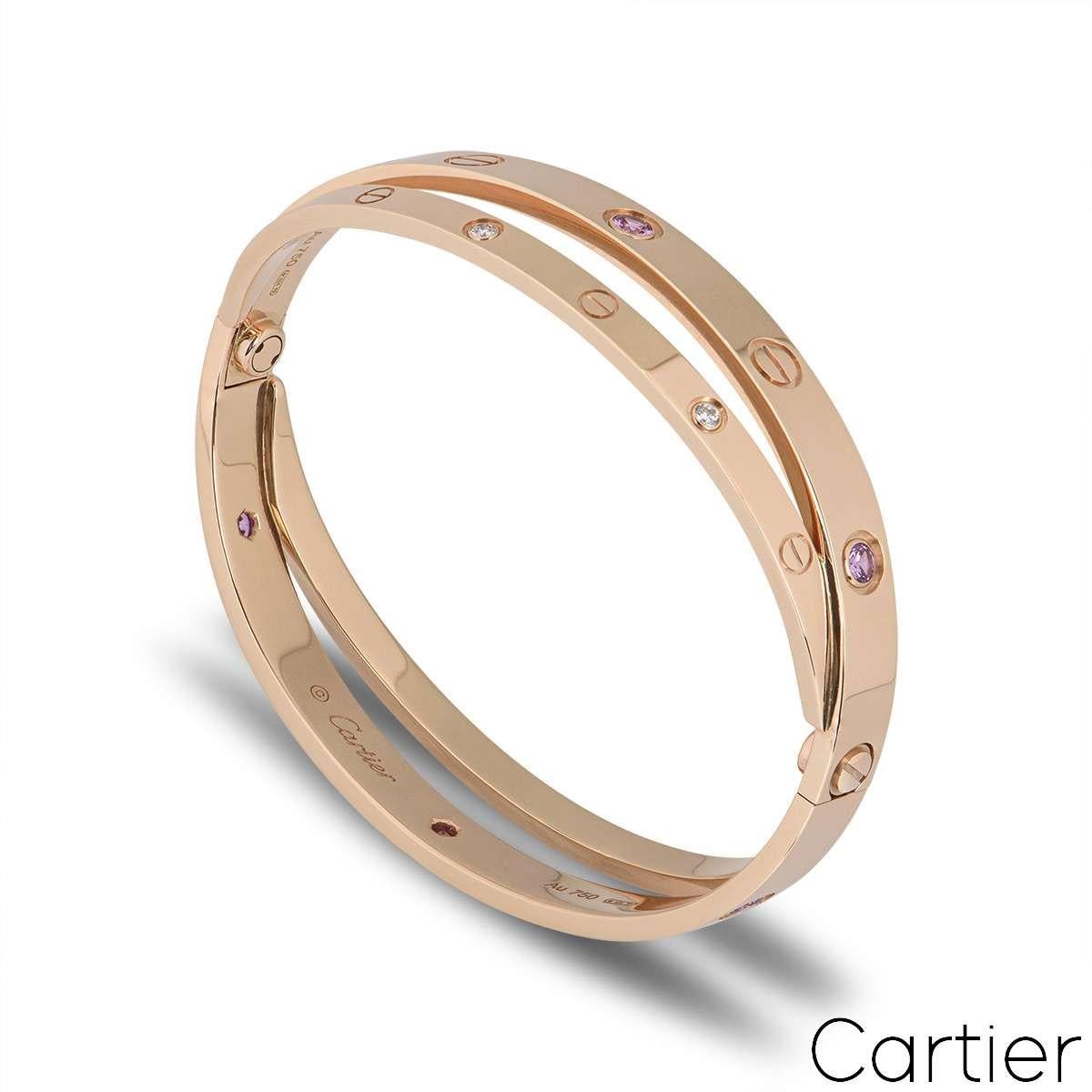 An 18k rose gold half diamond and pink sapphire double Cartier bracelet, from the iconic Love collection. Featuring the Cartier screw motif alternating with 6 round brilliant cut diamonds and 6 pink sapphires displayed around the outside. This