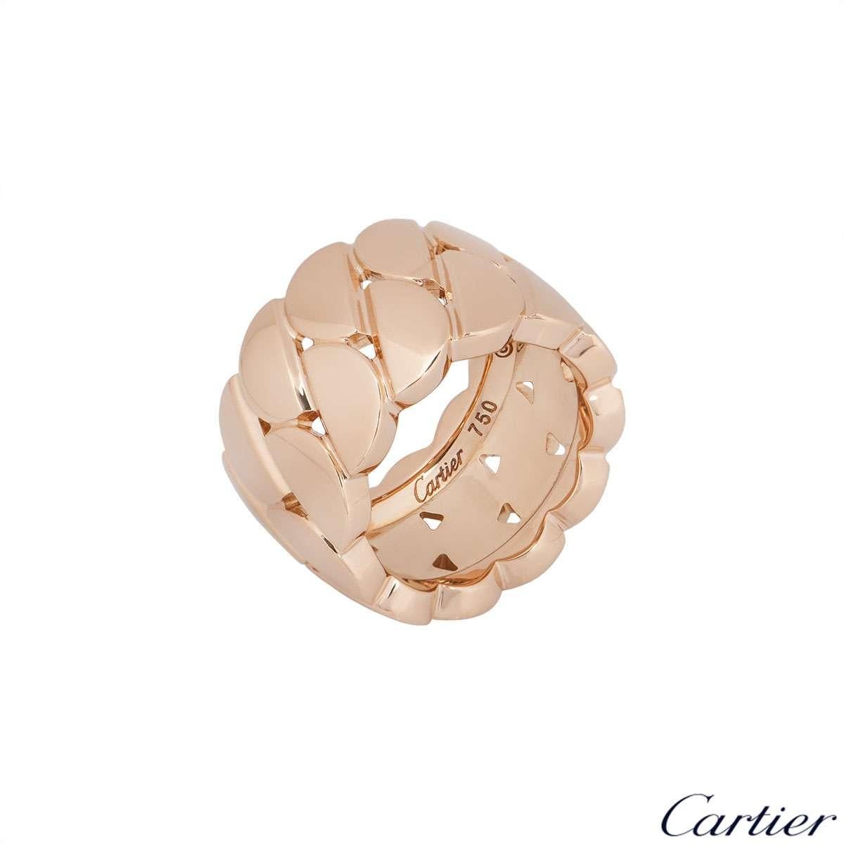 An 18k rose gold ring by Cartier from the La Dona collection. The 13mm ring is composed of two rows of interlinking semi-circular links throughout. The ring is a size UK L/US 5.5/EU 51 and has a gross weight of 19.90 grams.

The ring comes complete