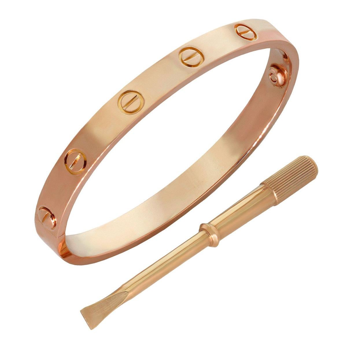An iconic Cartier bangle bracelet from the love collection crafted in 18k rose gold. The bracelet measures 16cm (6.28