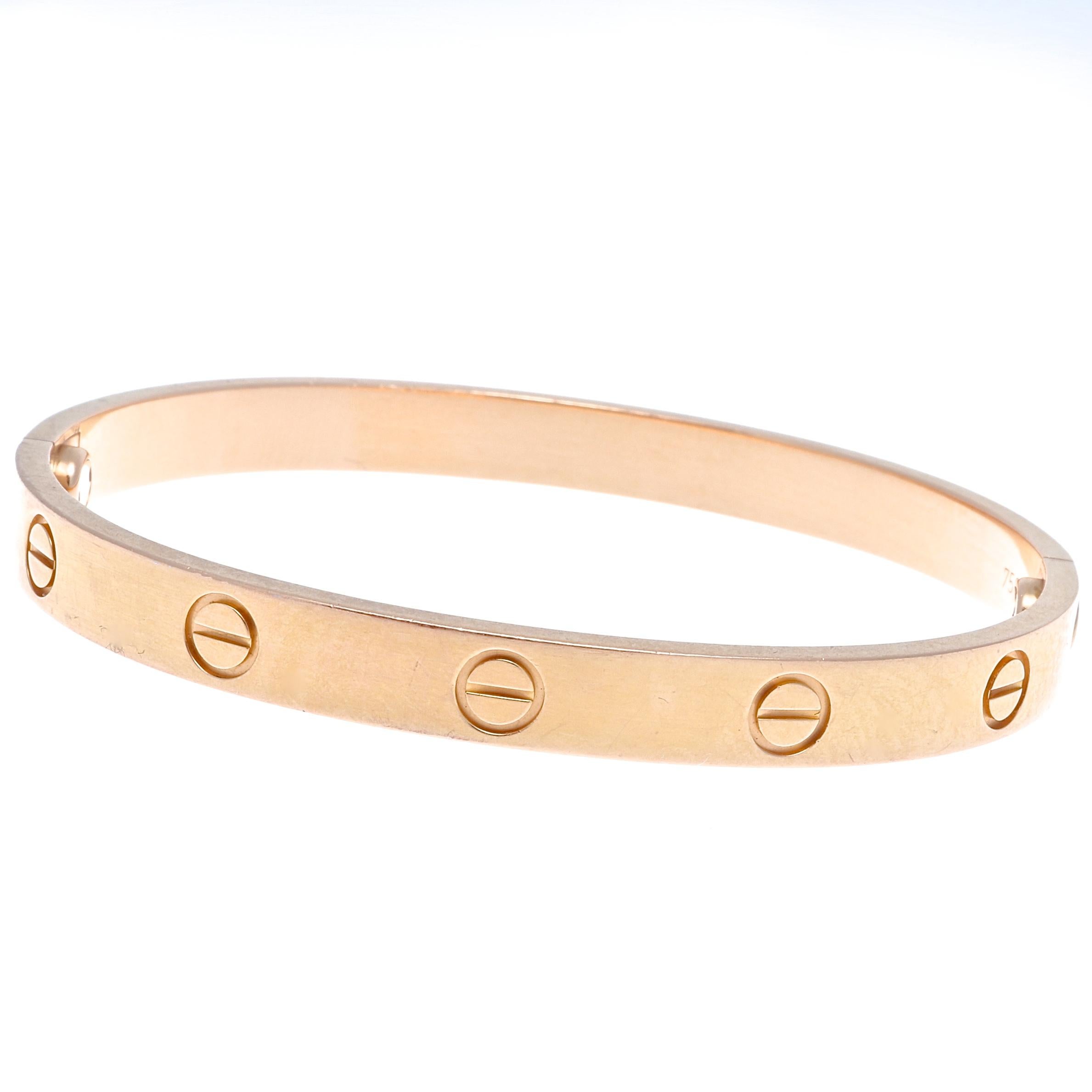 Dare to declare your love with Cartier in unforgettable fashion. Created in 1970's New York, this simple yet elegant design has become one if its iconic symbols. Crafted in 18k pink gold. Signed Cartier, numbered and accompanied with original