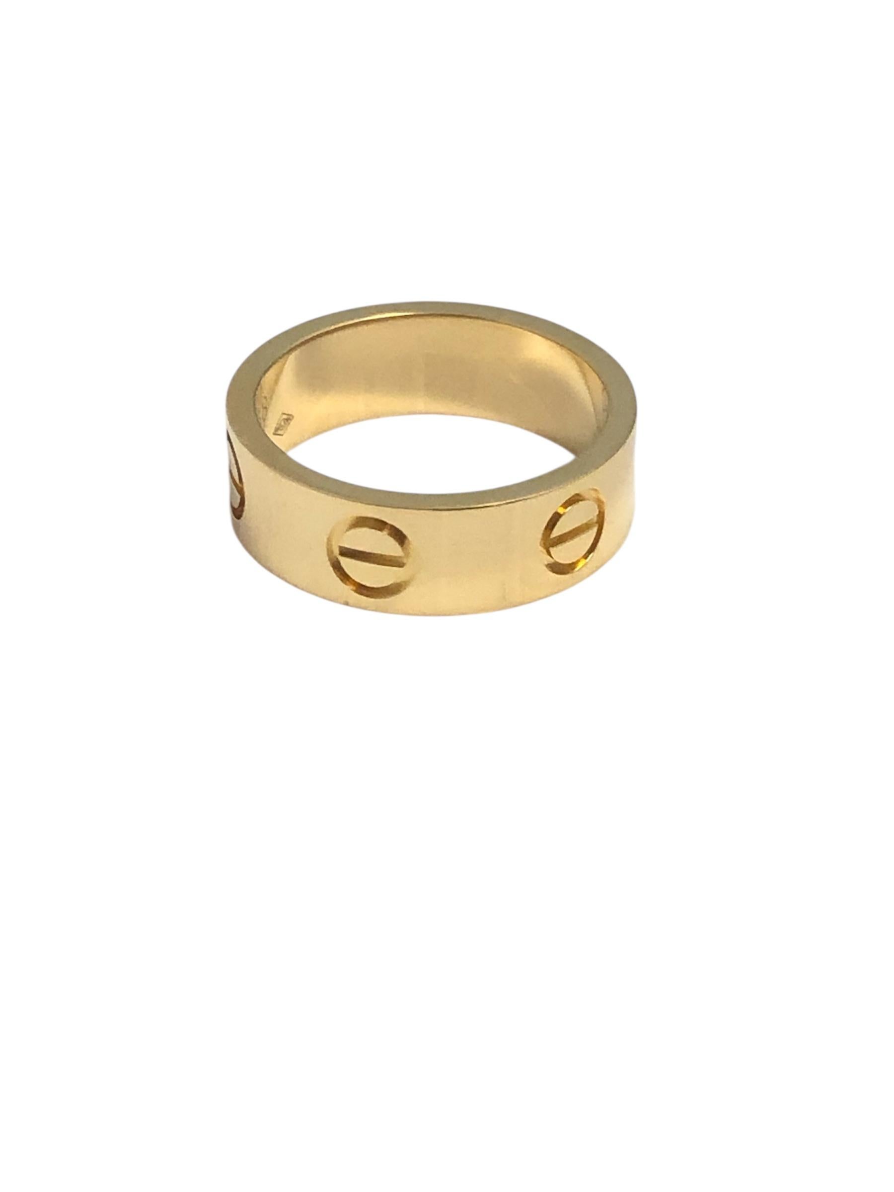 Cartier Rose Gold Love collection Band Ring In Excellent Condition For Sale In Chicago, IL