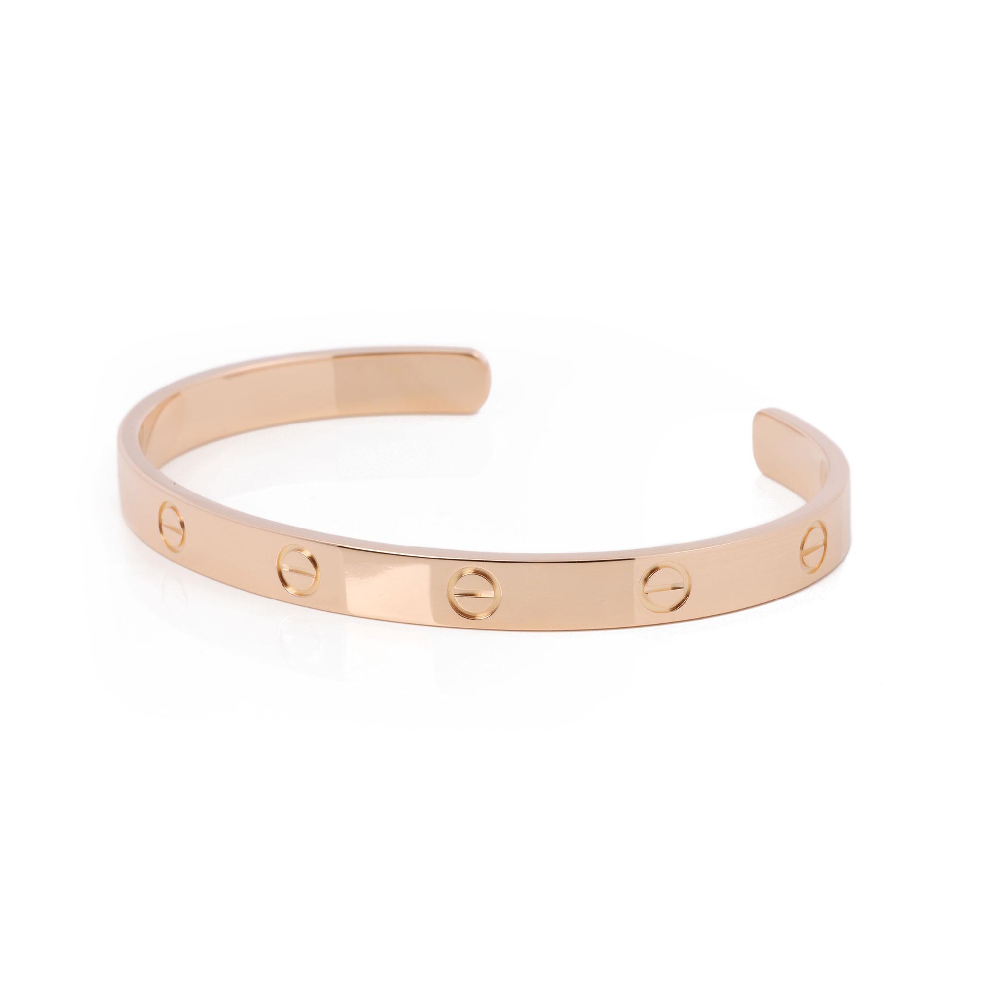 This cuff bangle by Cartier is from their Love collection and is made in 18ct rose gold. Accompanied with a Cartier pouch. Our Xupes reference is J577 should you need to quote this. 