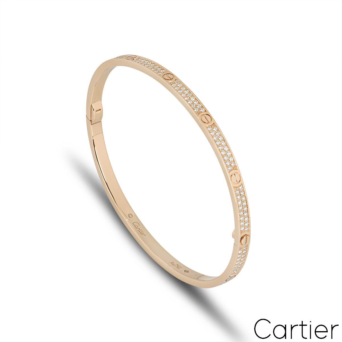 A sparkly 18k rose gold diamond Cartier bracelet from the Love collection. The bracelet comprises of the iconic screw motifs around the outer edge complemented with 177 round brilliant cut pave set diamonds in between. The diamonds have a total