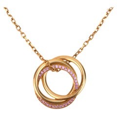 Cartier Collier pendentif Trinity en or rose et saphirs roses