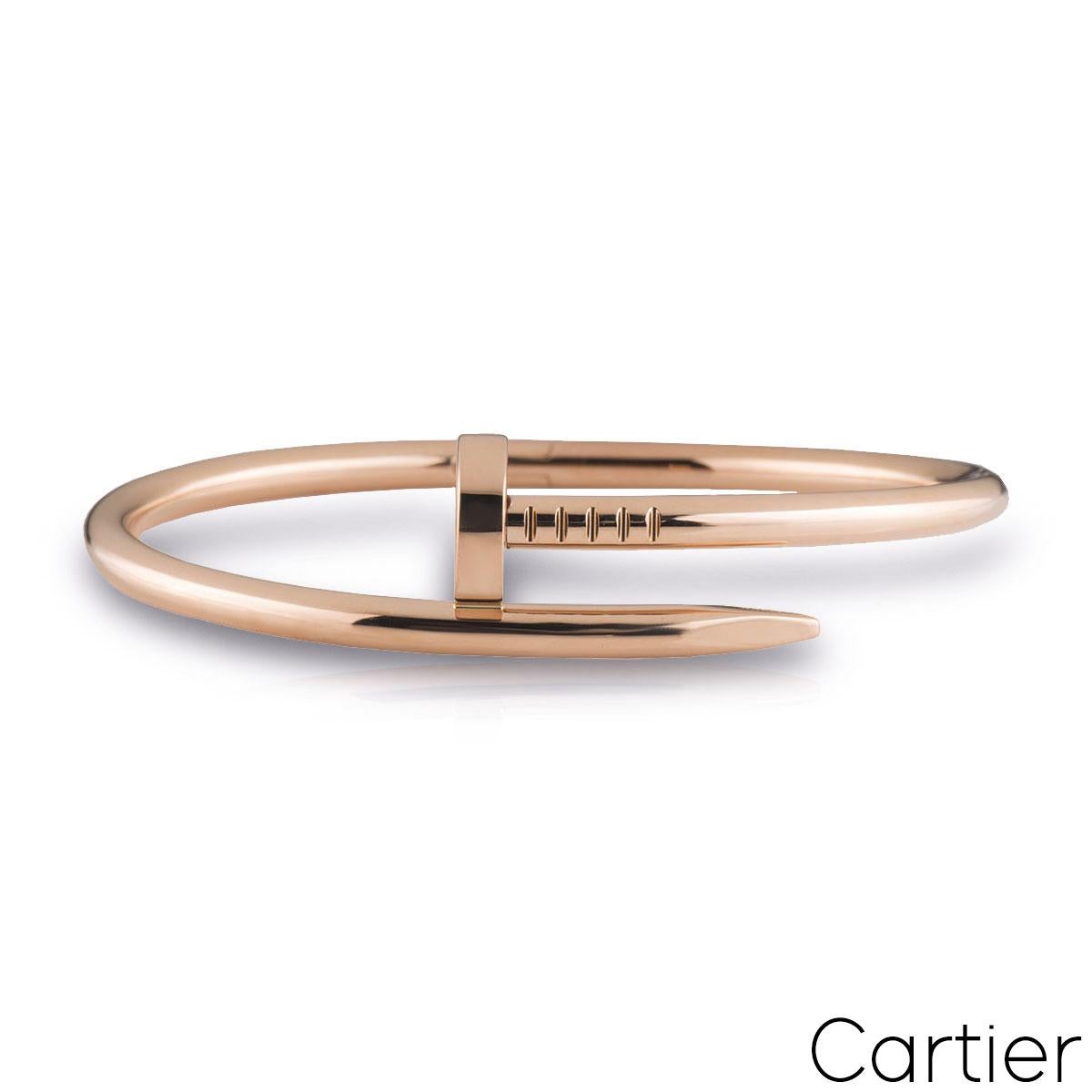 An iconic 18k rose gold Cartier bracelet from the Juste Un Clou collection. The bracelet is wrapped around with a nail head at one end and nail end at the other. The bracelet is size 17 with the old style clasp fitting and has a gross weight of 32.9