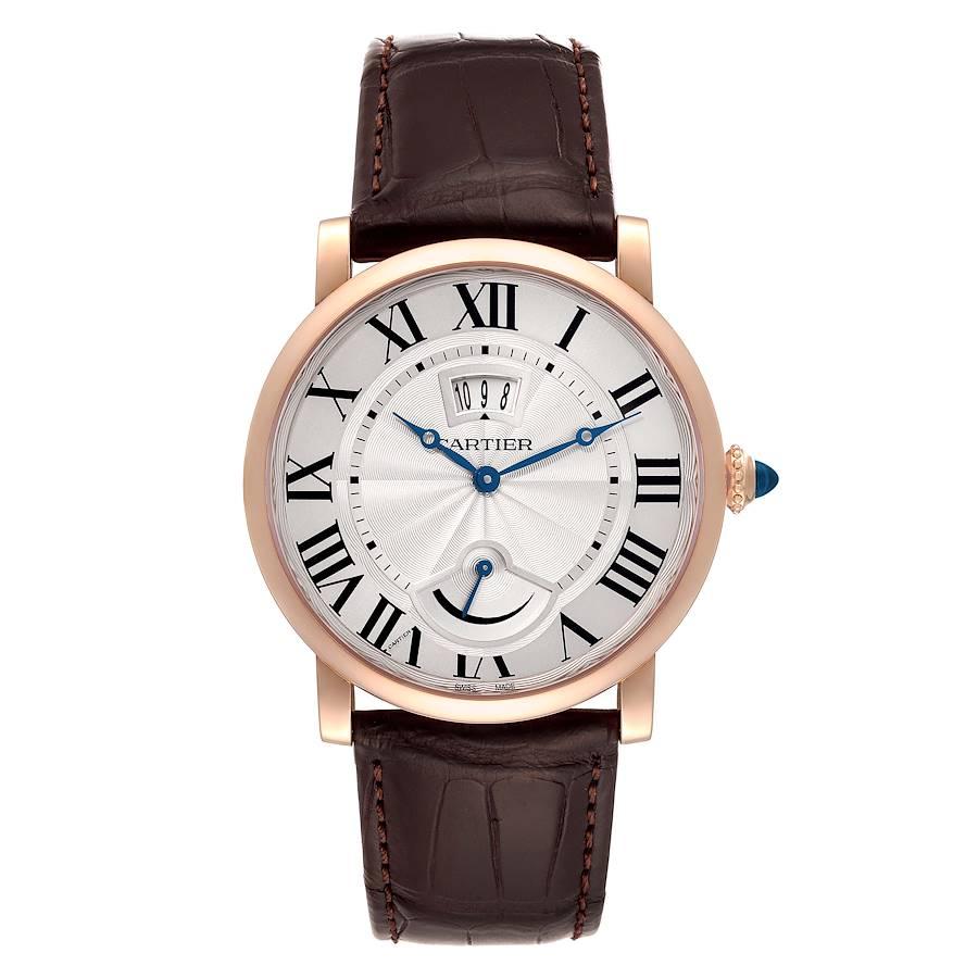Cartier Rotonde Power Reserve 18k Rose Gold Silver Dial Mens Watch W1556252. Manual winding movement. 18k rose gold case 40.0 mm in diameter. Fluted crown set with the blue spinel cabochon. . Scratch resistant sapphire crystal. Silver guilloche dial