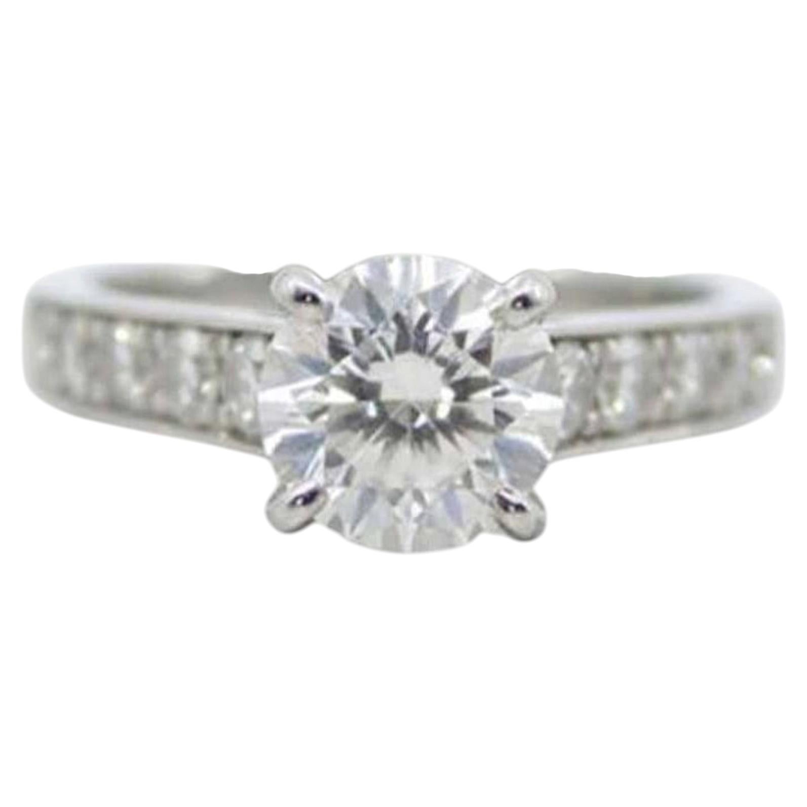 Cartier Runder Brillant Diamant Platin Verlobungsring im Angebot