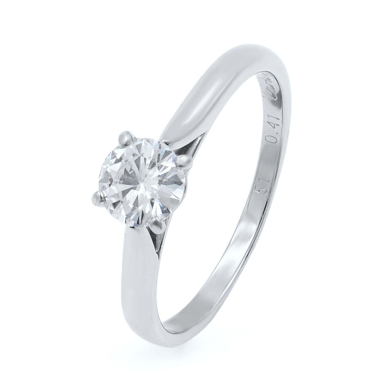 Cartier Classic Solitaire Engagement Ring.
1895 collection from Cartier.
Solitaire diamond weighs 0.41cts H VS1. 
Ring size: 51 (US 5.5-5.75).
Ring is in excellent condition. Has minimal signs of wear ( will be polished before shipping).
Comes with