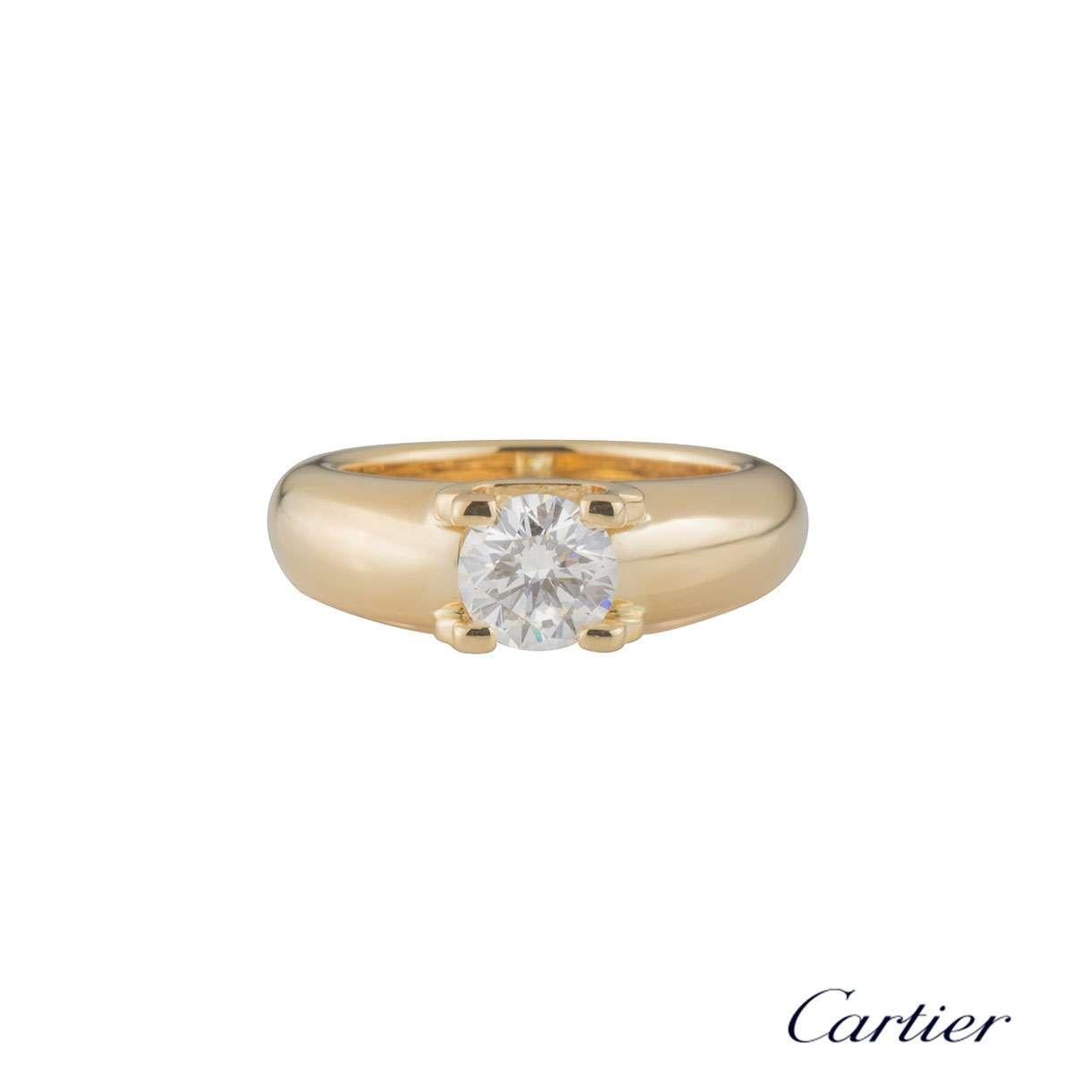 An 18k yellow gold diamond ring from the Cartier C de Cartier collection. The ring is set to the centre with a round brilliant cut diamond  in a C de cartier motif 1.01ct , G colour and VVS2 in clarity. The tapered ring measures 4mm in width and is