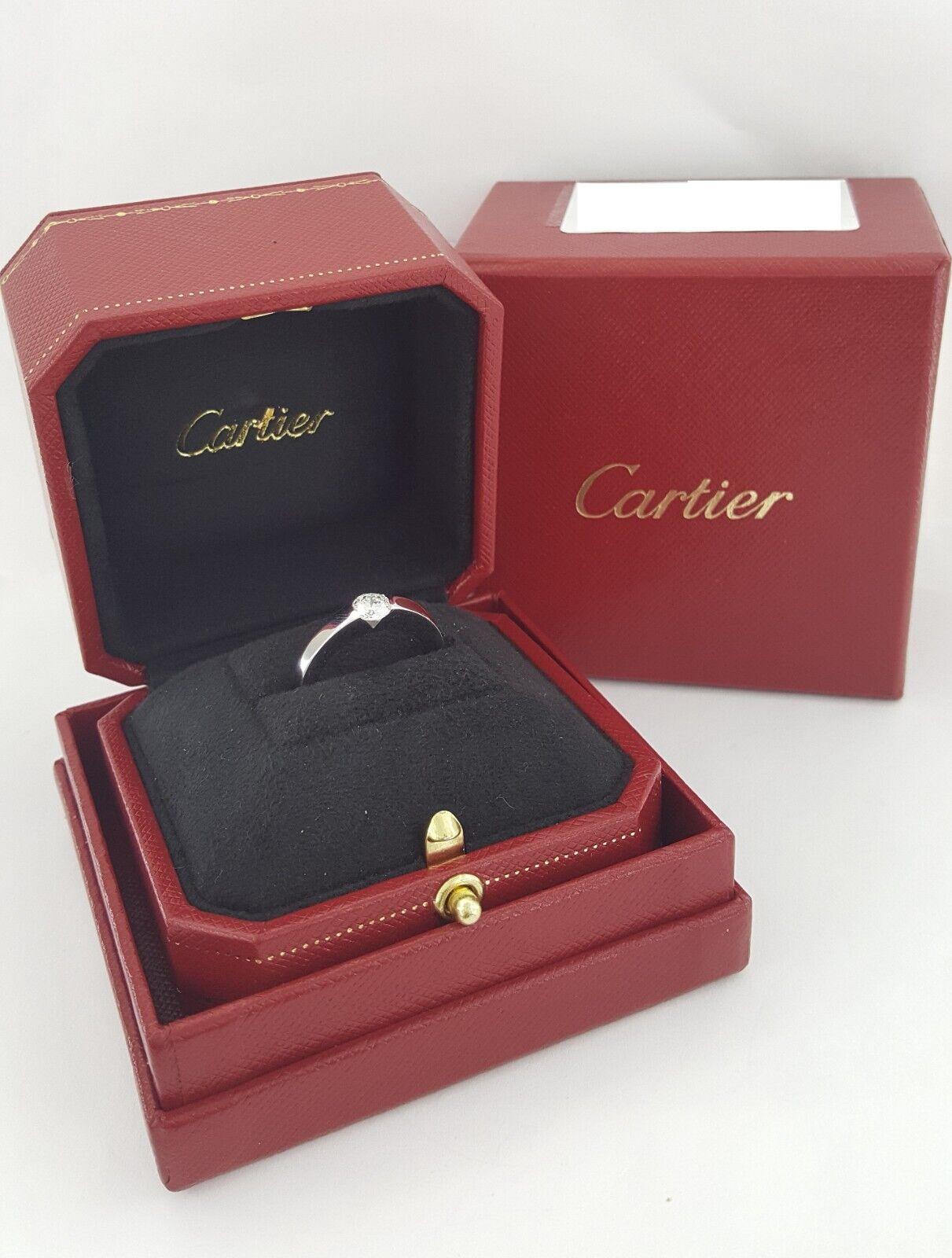 Modern Cartier Round Diamond Solitaire Tapered Baguette Platinum Engagement Ring
