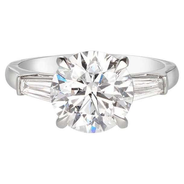 CARTIER Round Diamond Solitaire Tapered Baguette Platinum Engagement ...