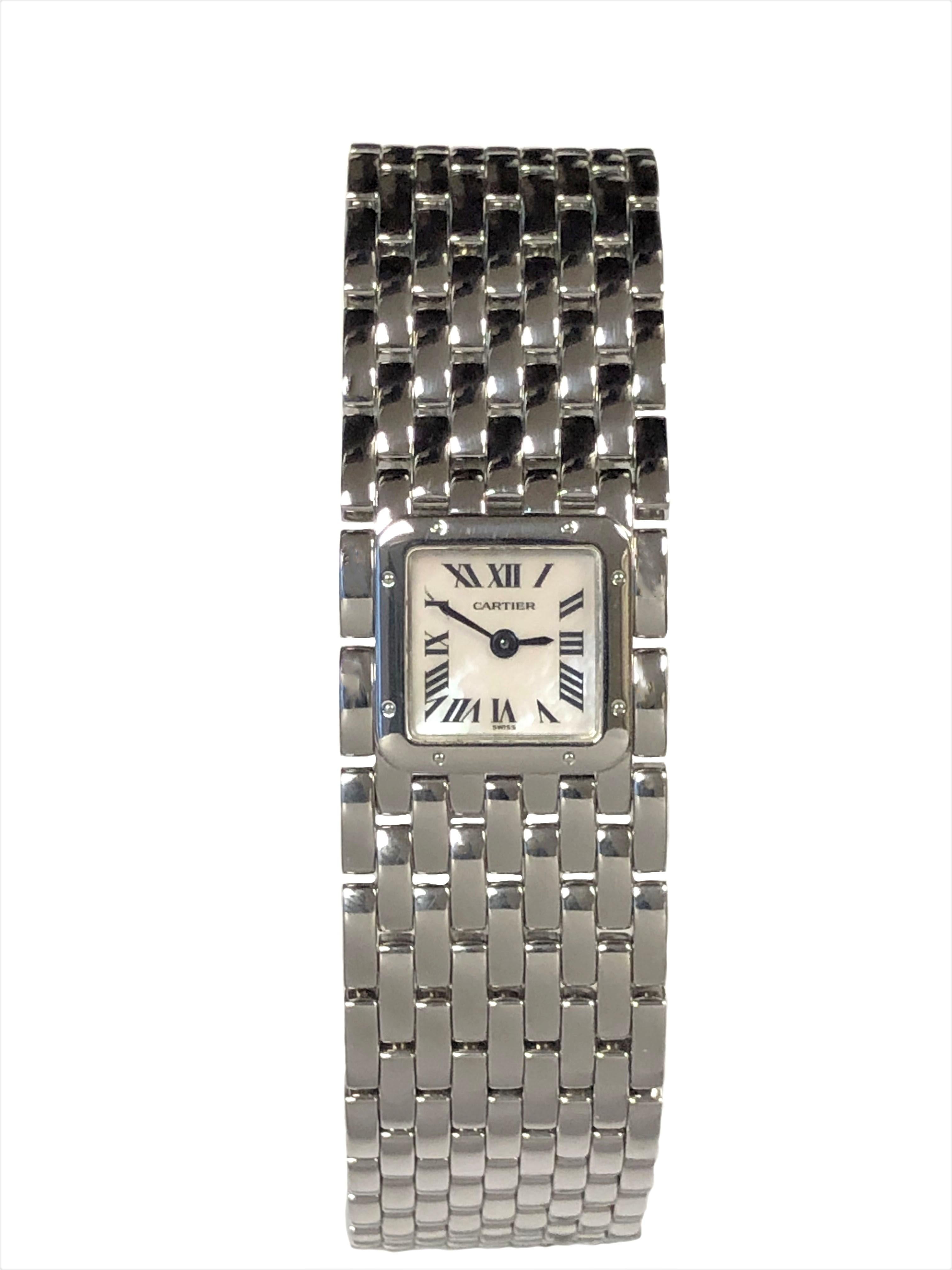 Circa 2005 Cartier Ruban Ladies bracelet wrist watch, Quartz movement, White Mother-of-Pearl dial. 7/8 inch wide bracelet with hidden deployment buckle. Wrist size 6 1/2 inches and has links that can be removed for sizing smaller if needed. Comes in