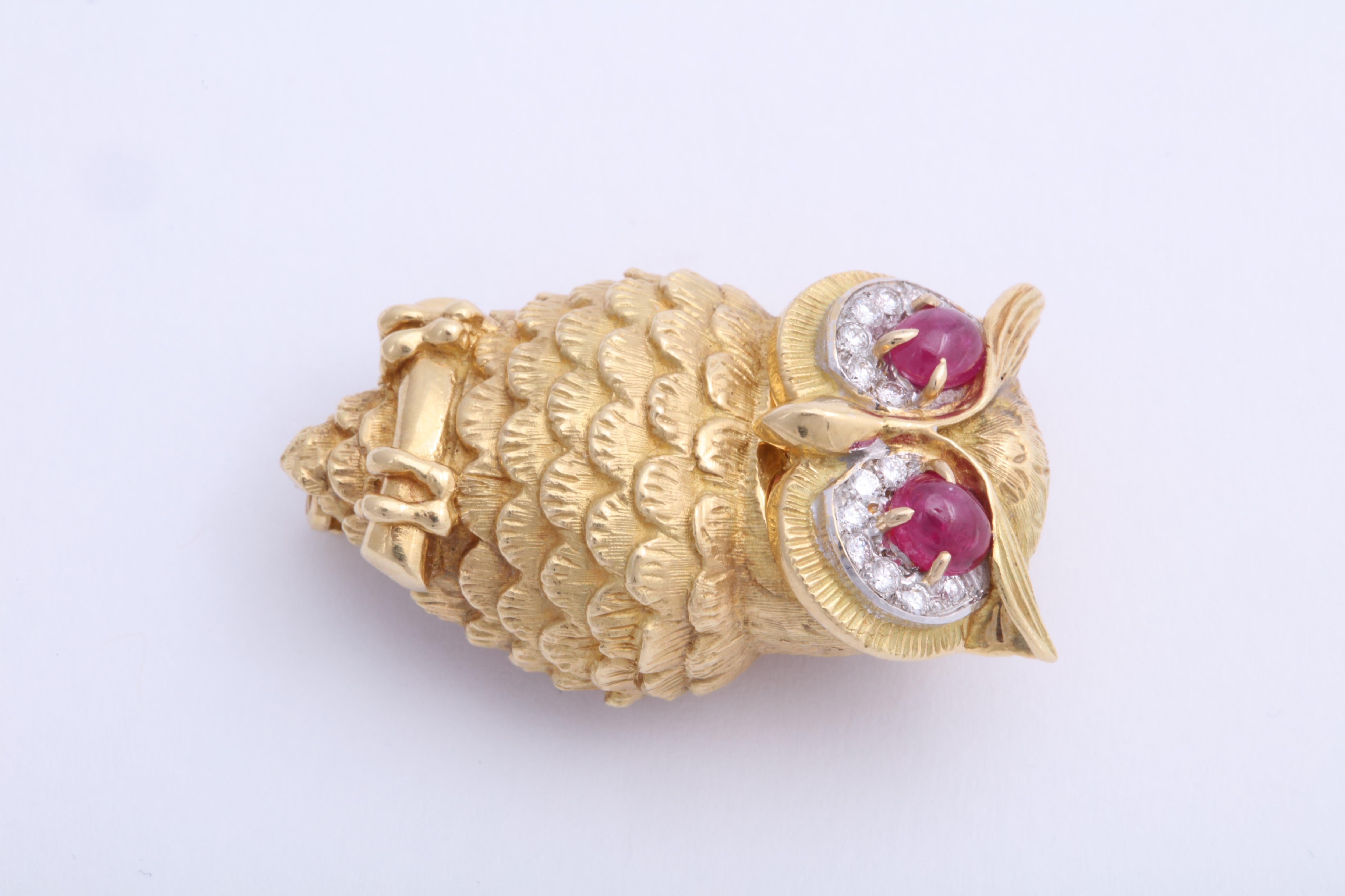 Cartier NY c. 1965. Owl in 18K yellow gold with with ruby and diamond eyes. 