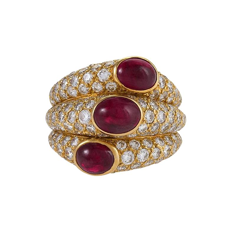Anello Cartier con rubino e diamante "a tre bande
