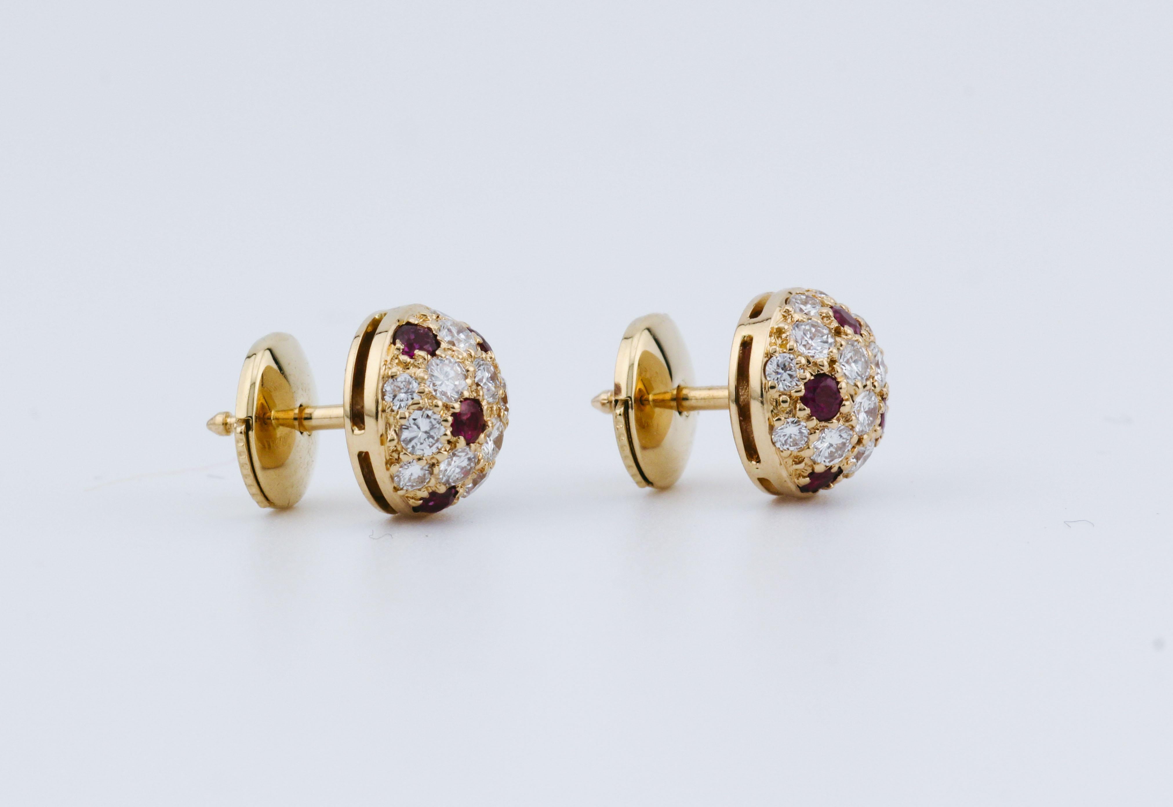 The Cartier Ruby Diamond 18K Yellow Gold Petite Dome Earrings are a stunning example of Cartier’s timeless elegance and superior craftsmanship. These stud earrings are crafted from luxurious 18K yellow gold, shaped into graceful petite domes that