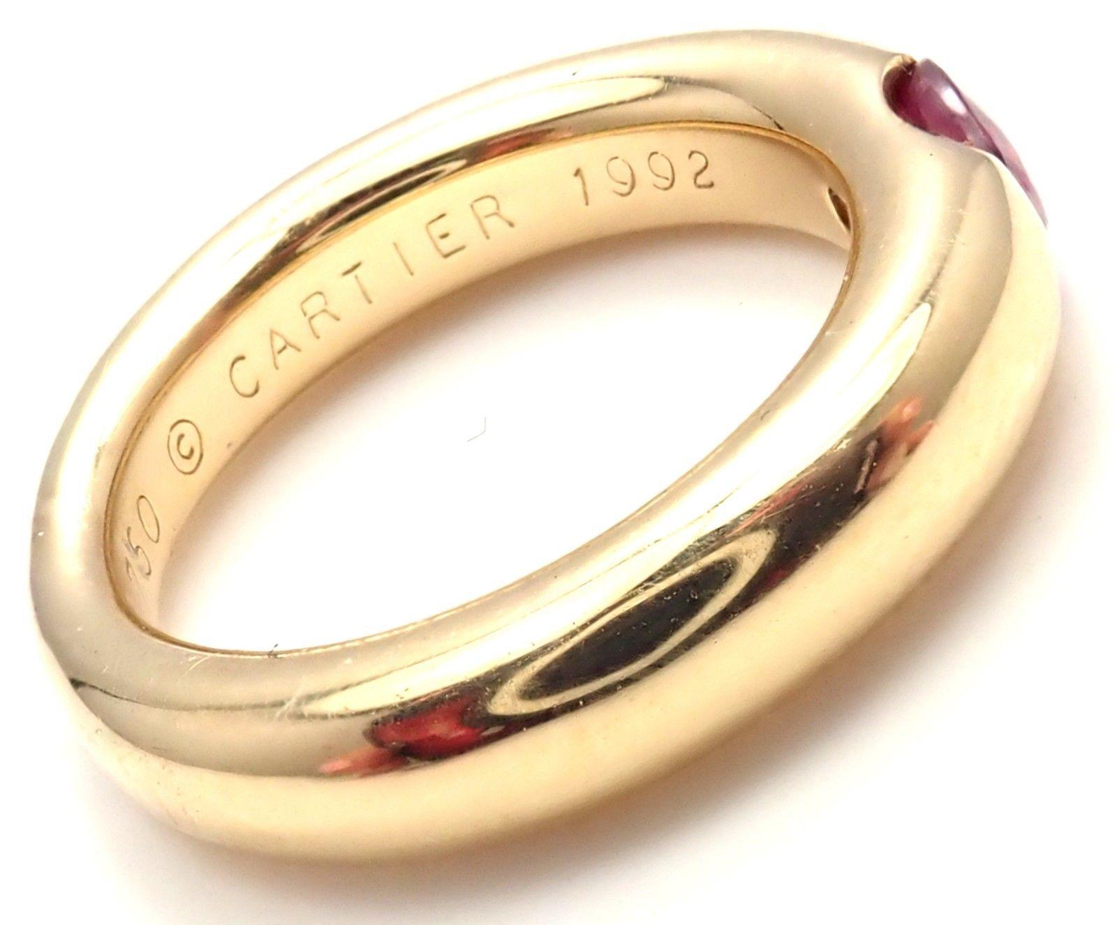 18k Yellow Gold Ellipse Ruby Band Ring by Cartier.
With 1 oval-shaped beautiful ruby 5mm x 4mm.
Details:
Width: 4mm
Weight: 9.3 grams
Ring Size: European 48, US 4 1/2
Stamped Hallmarks: Cartier 750 48 1992 D 08455
*Free Shipping within the United