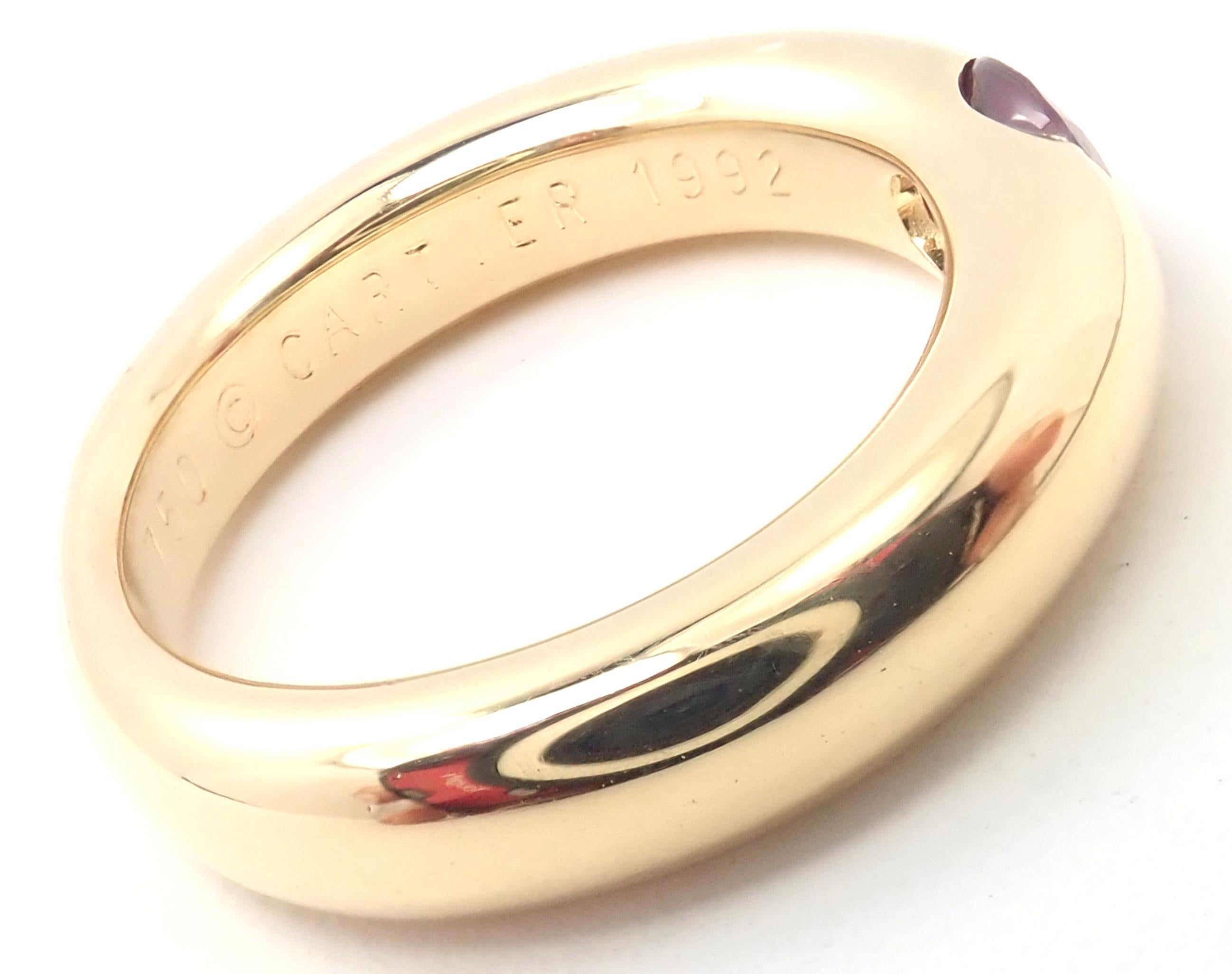 18k Yellow Gold Ellipse Ruby Band Ring by Cartier.
With 1 oval-shaped beautiful ruby 5mm x 4mm.
Details:
Width: 4mm
Weight: 9.1 grams
Ring Size: EEuropean 50, US 5 1/4
Stamped Hallmarks: Cartier 750 51 1992 DXXXX (serial number omitted)
*Free