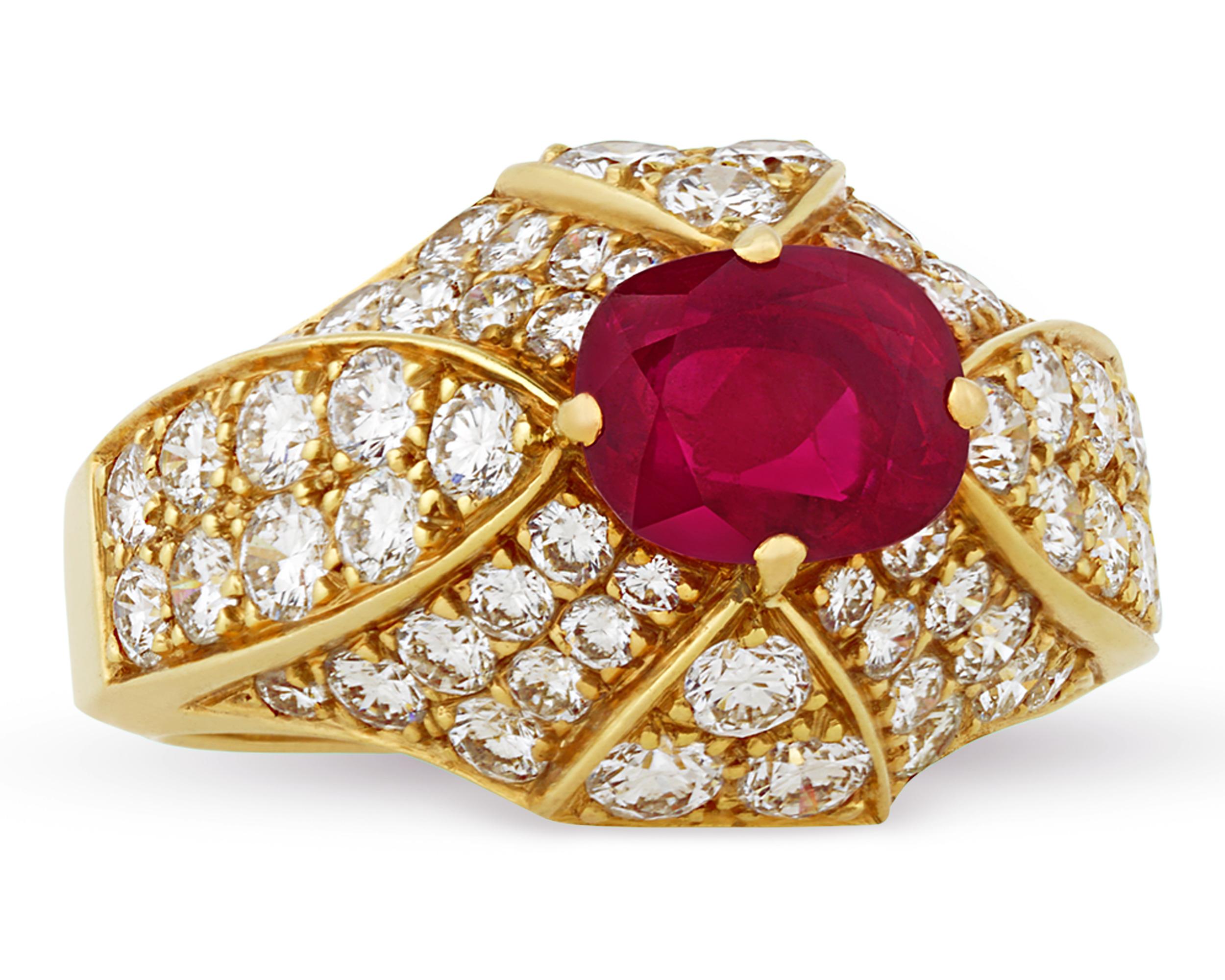 Elegant and sophisticated, this Cartier ring features a stunning ruby weighing 0.70 carats. The crimson red gemstone is accented by 60 round brilliant diamonds, totaling approximately 3.00 carats, and is set in 18K yellow gold.

Founded in Paris in