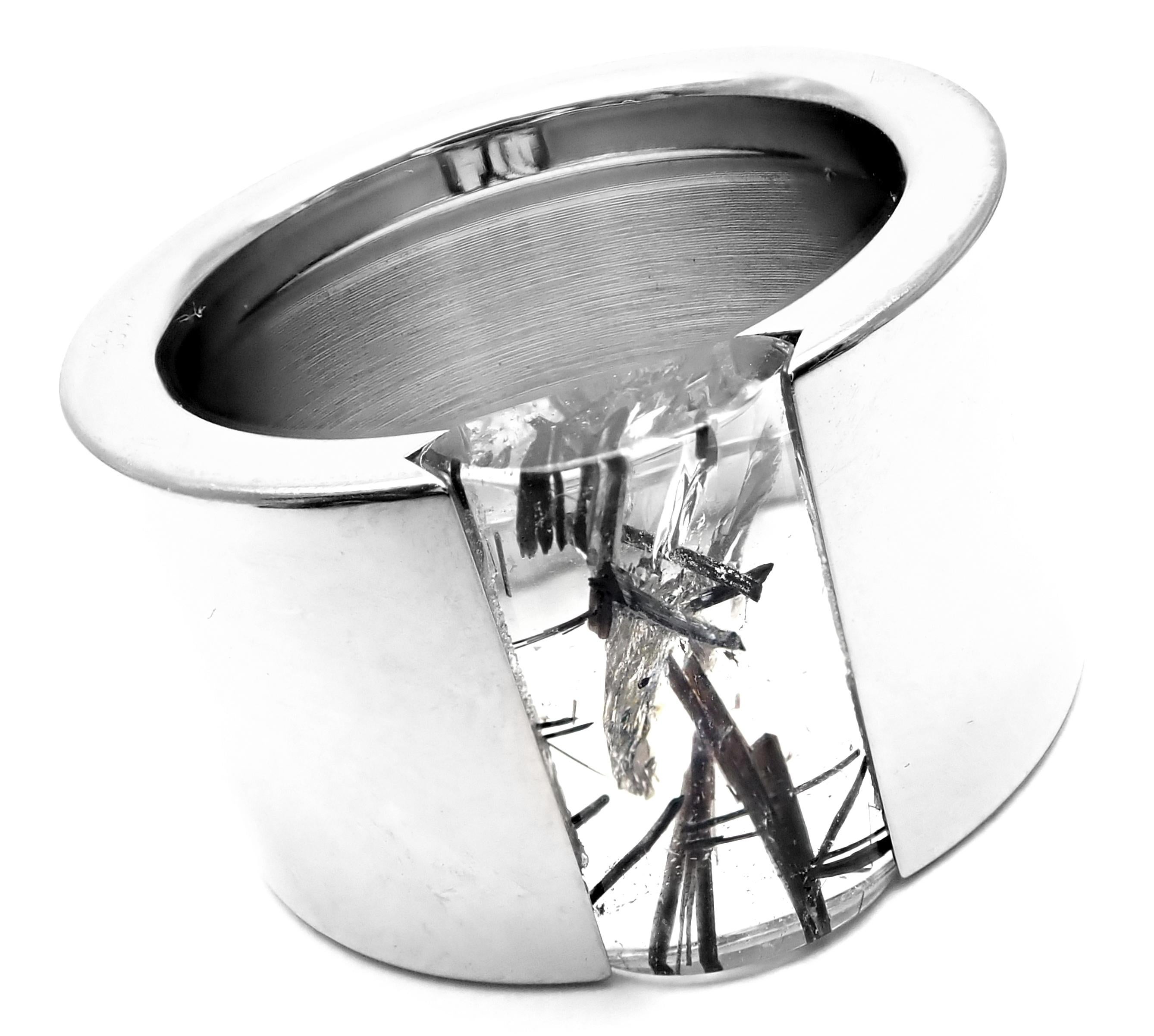 18k White Gold Rutilated Quartz Wide Band Ring by Cartier. 
With 1 x Rutilated Quartz 
Details: 
Ring Size: 8 US, Europe 57
Width: 14mm 
Weight: 20.6 grams
Stamped Hallmarks: Cartier 750 57 1999 H66022
*Free Shipping within the United States*  
YOUR