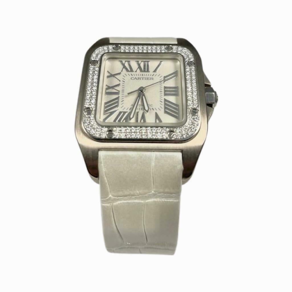 Brand: Cartier
Model Name: Santos 100
Model Number: 2881
Material: White Gold
Metal Purity: 18k
Size: 33 MM
Stones: Diamonds
Bezels: Diamond
Dial Color: White
Bracelet: Leather
Box/Papers: Yes/yes
