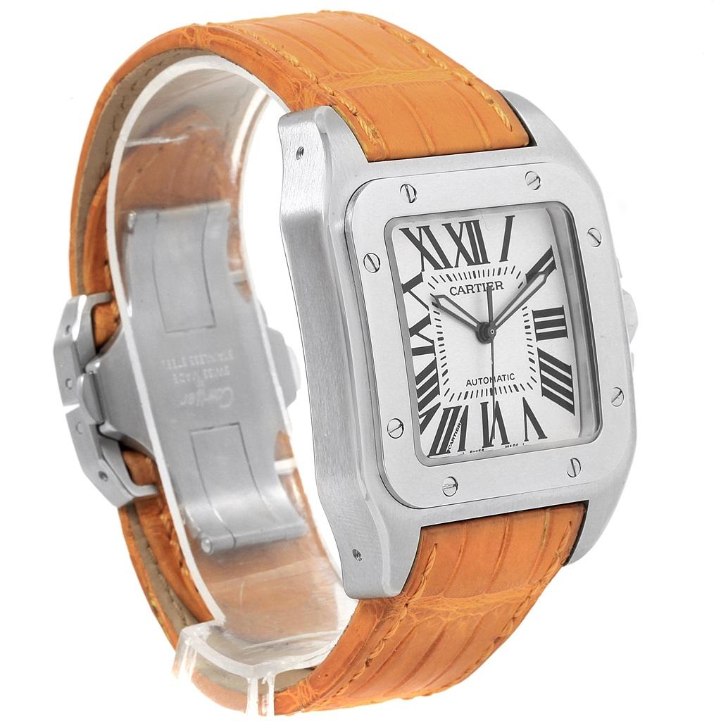 Cartier Santos 100 Silver Dial Orange Strap Steel Mens Watch W20073X8. Automatic self-winding movement caliber 049. Three body brushed stainless steel case 38.0 x 38.0 mm. Protected octagonal crown set with the faceted spinel. Stainless steel bezel