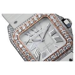 Montre Cartier Santos 100 en acier inoxydable et caoutchouc blanc avec lunette en or rose et diamants