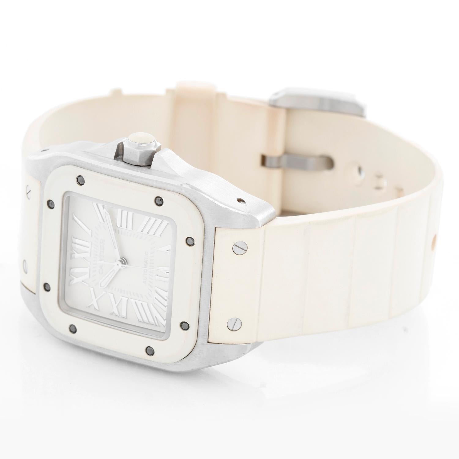 Cartier Santos 100 White Rubber & Steel Automatic  Unisex Watch W20122U2 - Automatic winding. Stainless steel case with white rubber bezel and crown (33mm x 43mm). White dial with Roman numerals. White rubber strap band with stainless steel Cartier