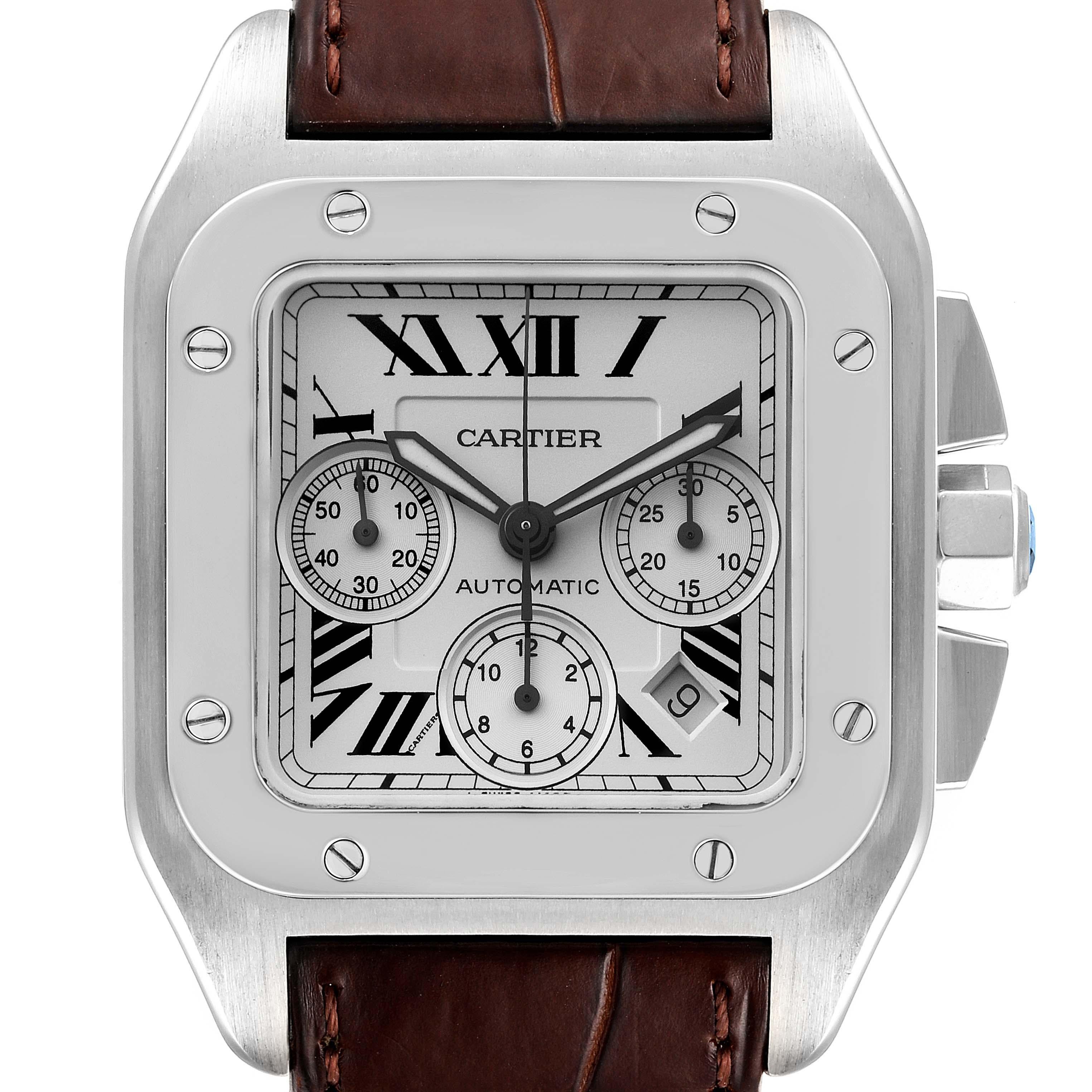 Cartier Santos 100 XL Silver Dial Brown Strap Chronograph Watch W20090X8. Automatic self-winding movement caliber 8630. Three body brushed stainless case 42.0 mm. Stainless steel protected octagonal crown set with the faceted spinel. Stainless steel