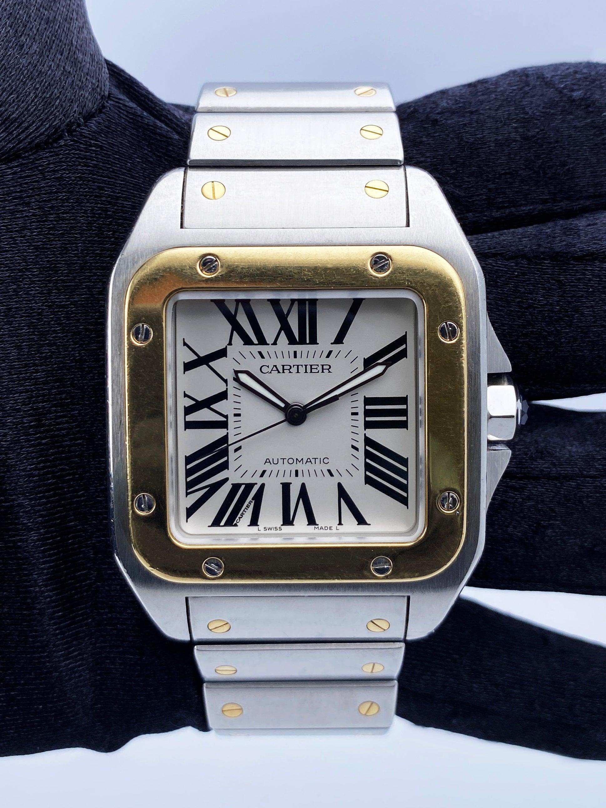Cartier Santos-100 W200728G Mens Watch. 38mm stainless steel case with 18K yellow gold fixed bezel. Silver dial with black steel luminous hands and black Roman numeral hour markers. Minute markers on the inner dial. Will fit up to a 6.75-inch wrist.