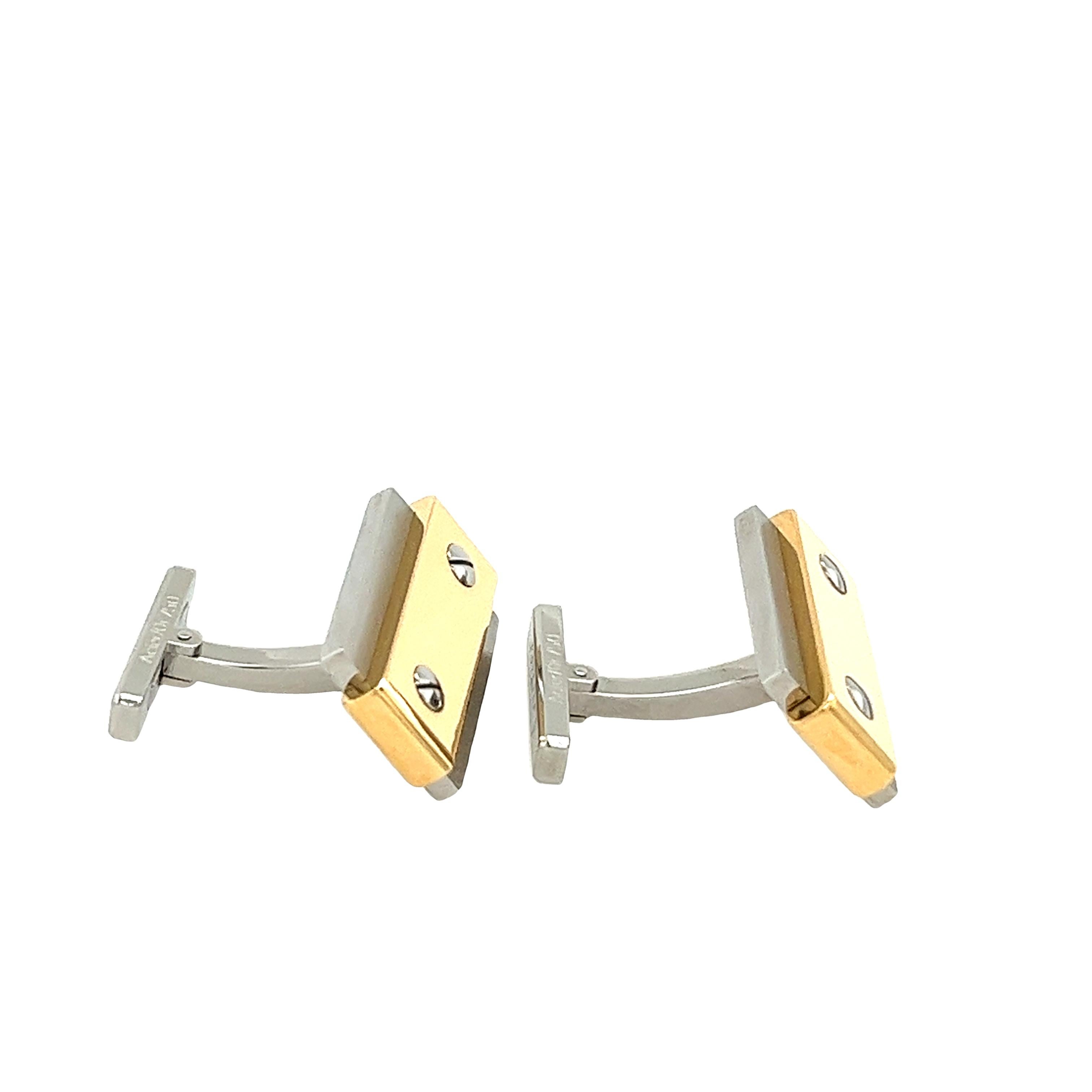 Add a touch of luxury to your ensemble with the Cartier Santos 18ct Gold & Stainless Steel Acier Cufflinks. These iconic cufflinks blend the warmth of 18ct gold with the durability of stainless steel, exuding sophistication and style. With their