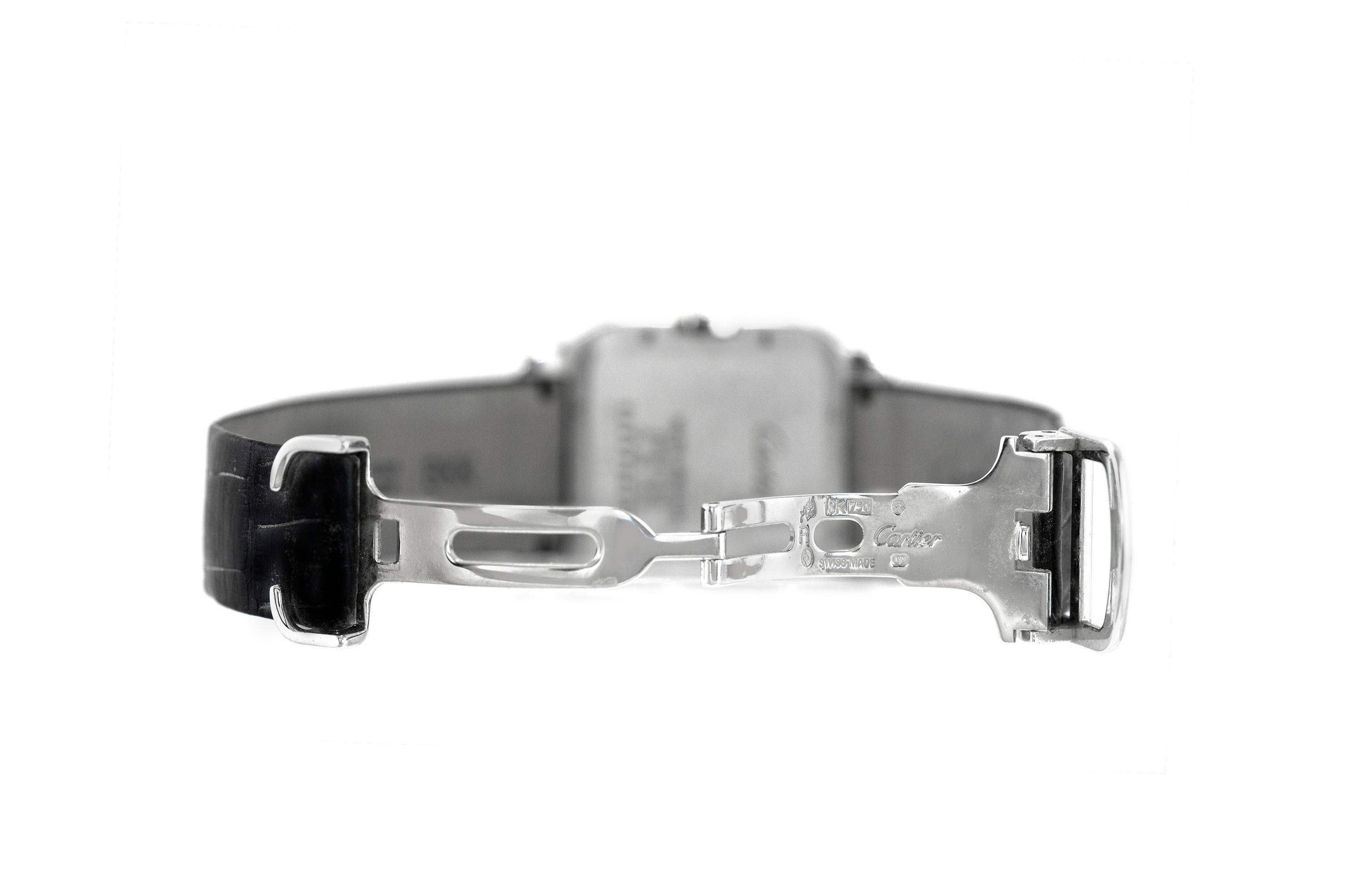 Finely crafted in 18k white gold and diamonds with back leather straps.
Cartier serial number: WH100251
Comes with original box and papers
Ladies size