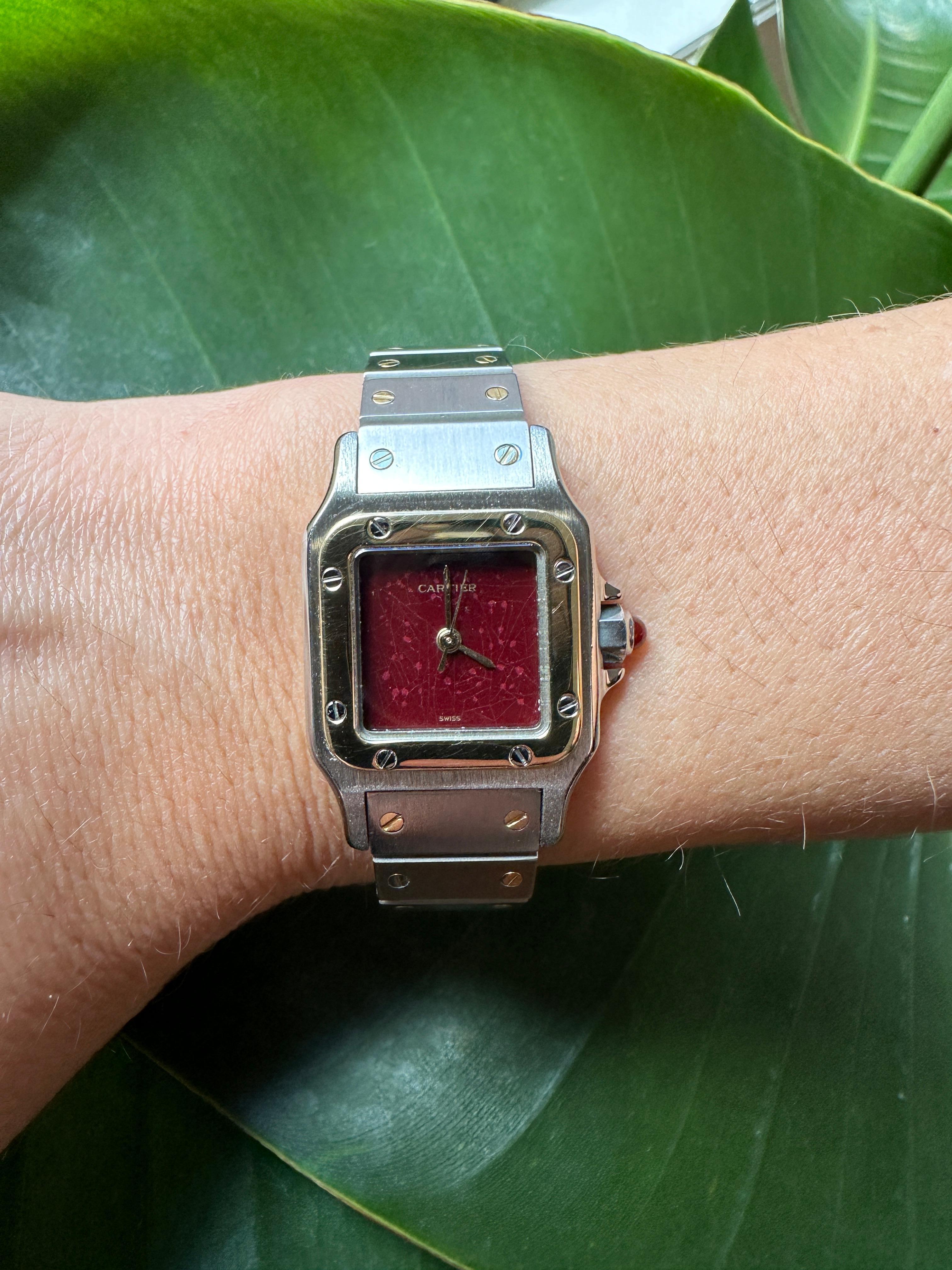 A rare and unique find, this Cartier Santos features the eye-catching 