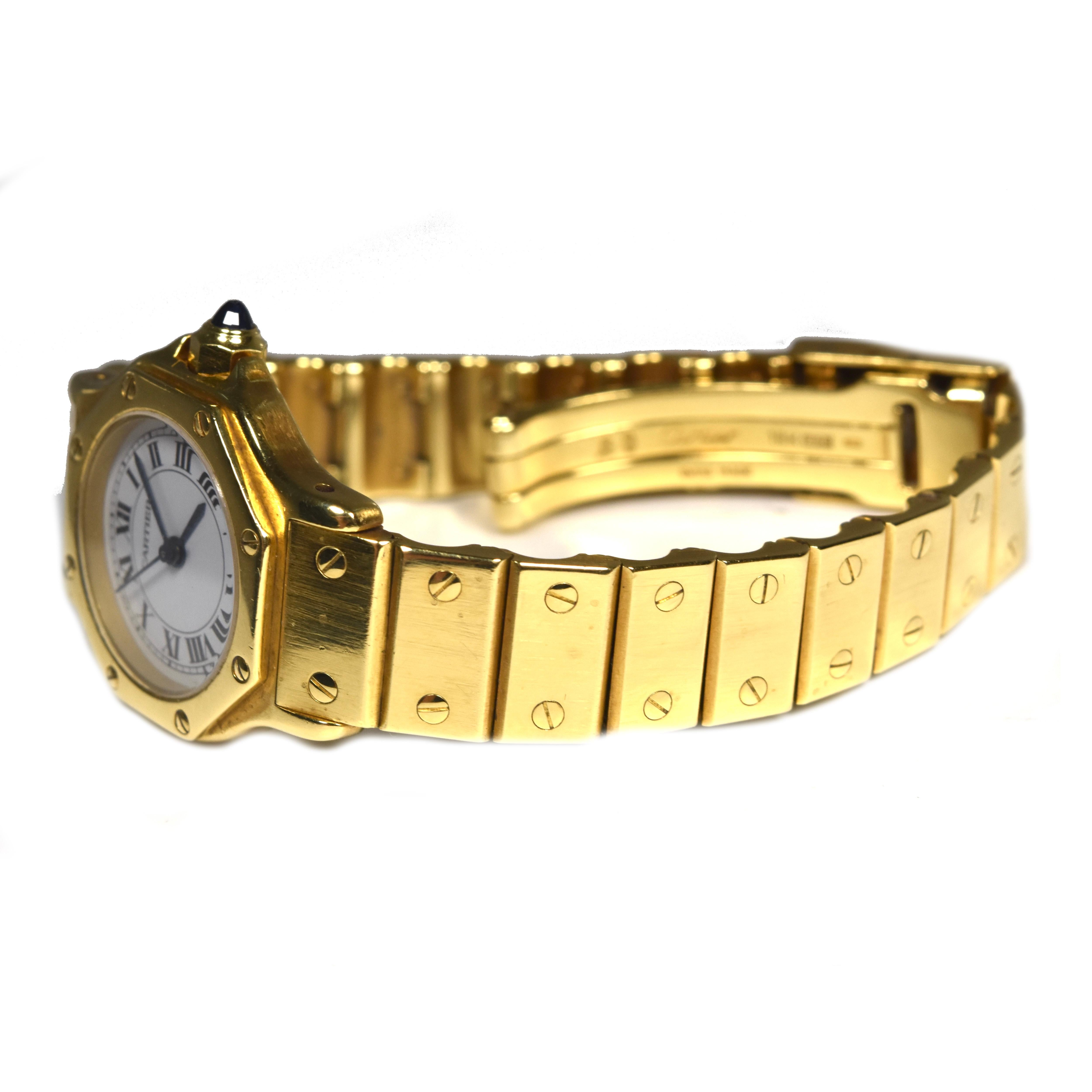 Brand: Cartier

Collection: Santos

Metal : 18k Yellow Gold 

Case Size: 29.5 mm

Stone :  Sapphire cabochon 

Dial : White Dial with Roman Numeral Index 

Hands : Roman Numeral Index​​​​​​​

​​​Includes: Brilliance Jewels 2 Year Warranty

         