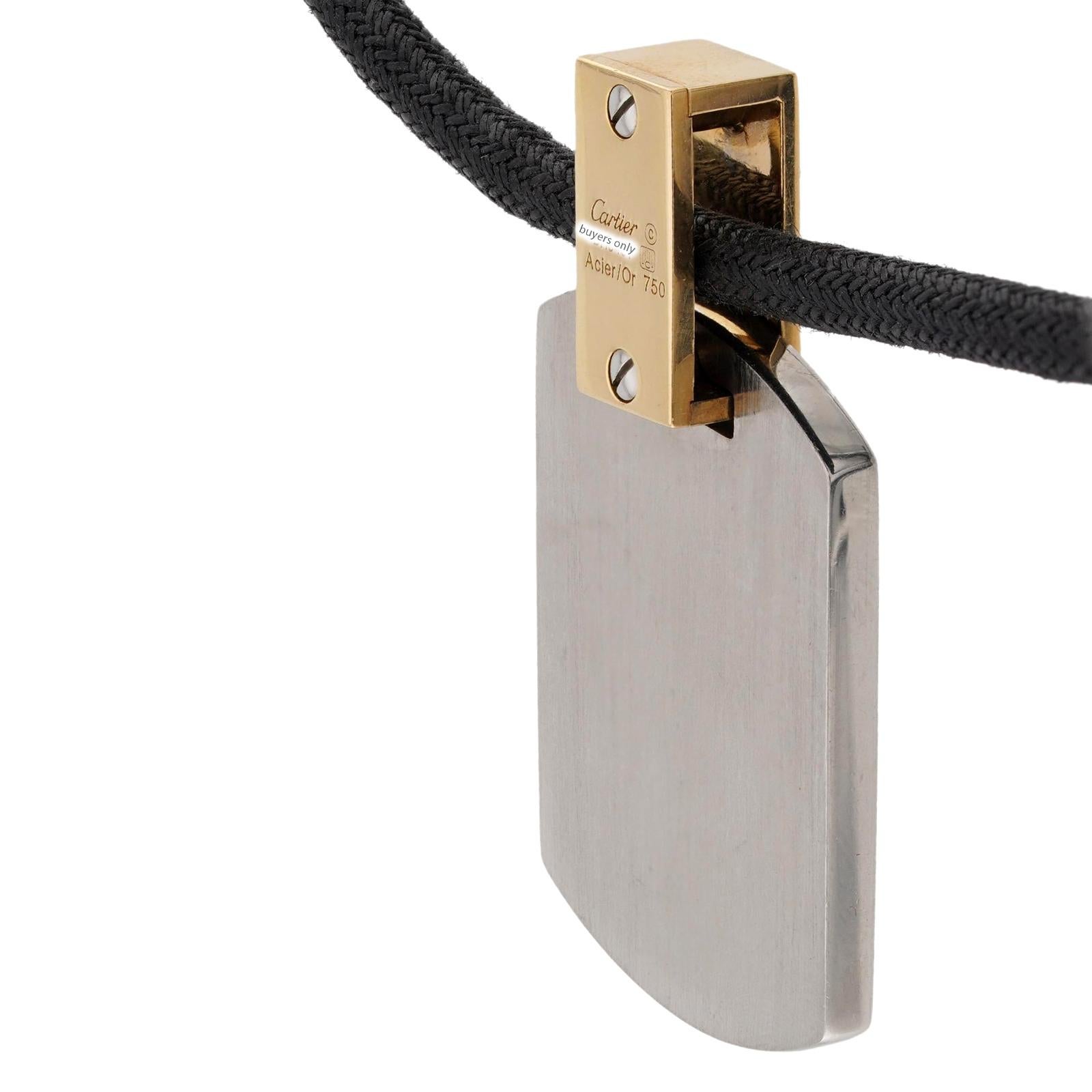 CARTIER Santos 18k Yellow Stainless Steel Gold Pendant Black Cord Necklace In Excellent Condition In New York, NY