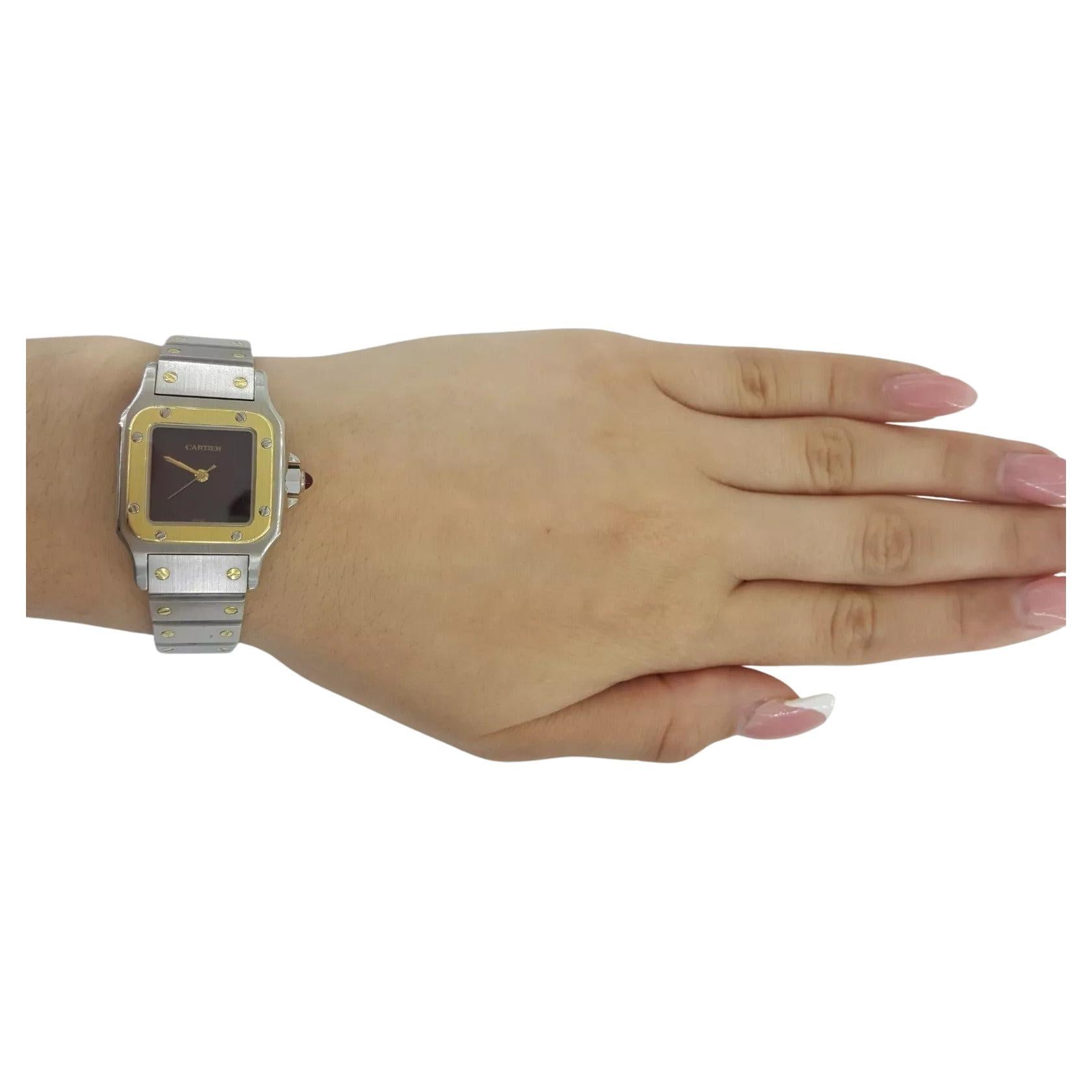 Cartier Santos Carrée – Burgundy Dial
18K Yellow Gold & Stainless Steel  Small Size 24mm

A timeless icon reimagined, this Cartier Santos Carrée exudes vintage charm and elegance. The watch features a distinctive burgundy dial that beautifully