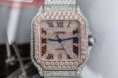 Montre Cartier Santos personnalisée en acier inoxydable et or rose avec diamants WSSA0018