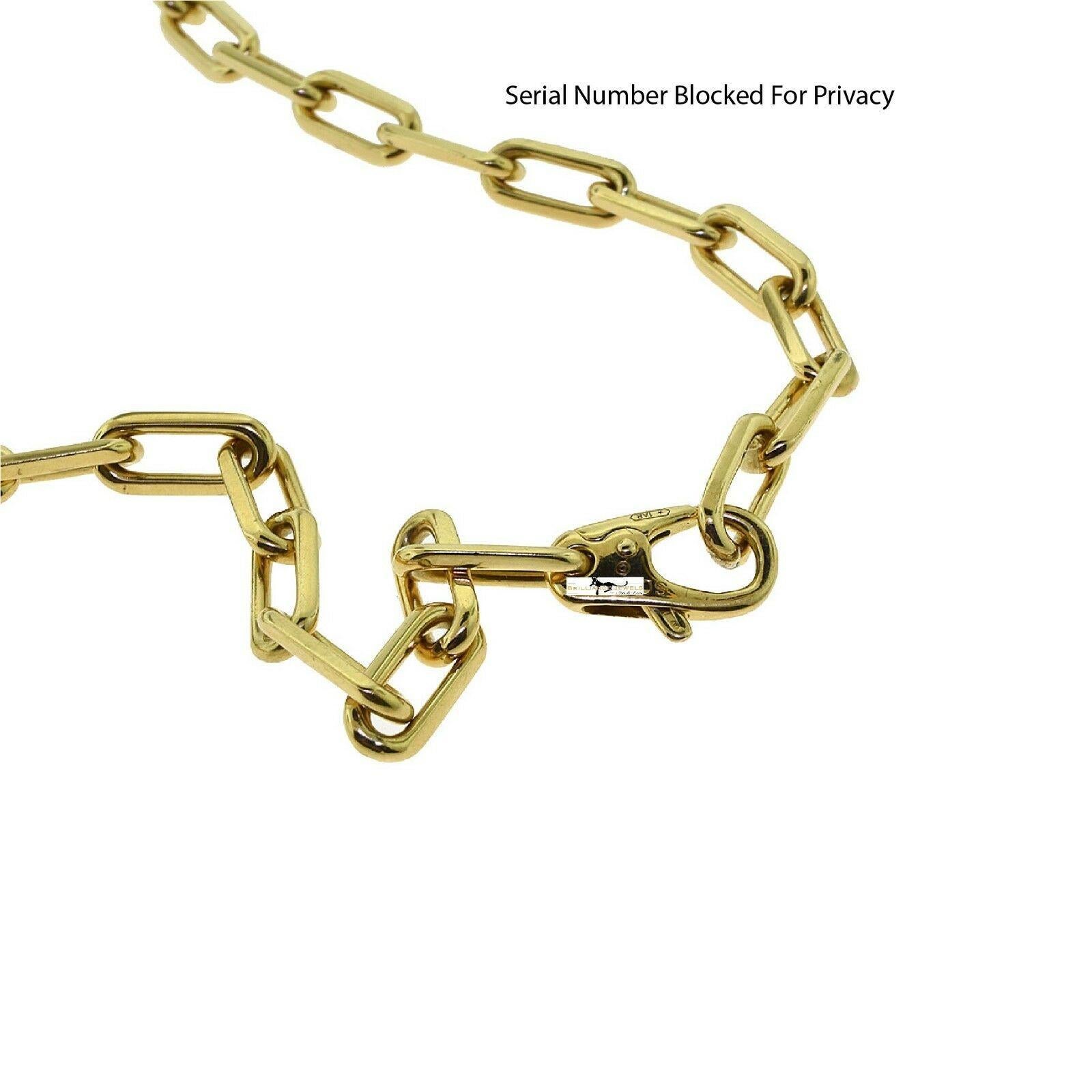 Designer: Cartier

Collection: Santos de Cartier

Style: Chain Link Necklace

Metal: Yellow Gold

Metal Purity: 18k

Total Item Weight (grams): 55

Necklace Length: 22 inches

Signature: Cartier 

Includes:  24 Months Brilliance Jewels Warranty

   