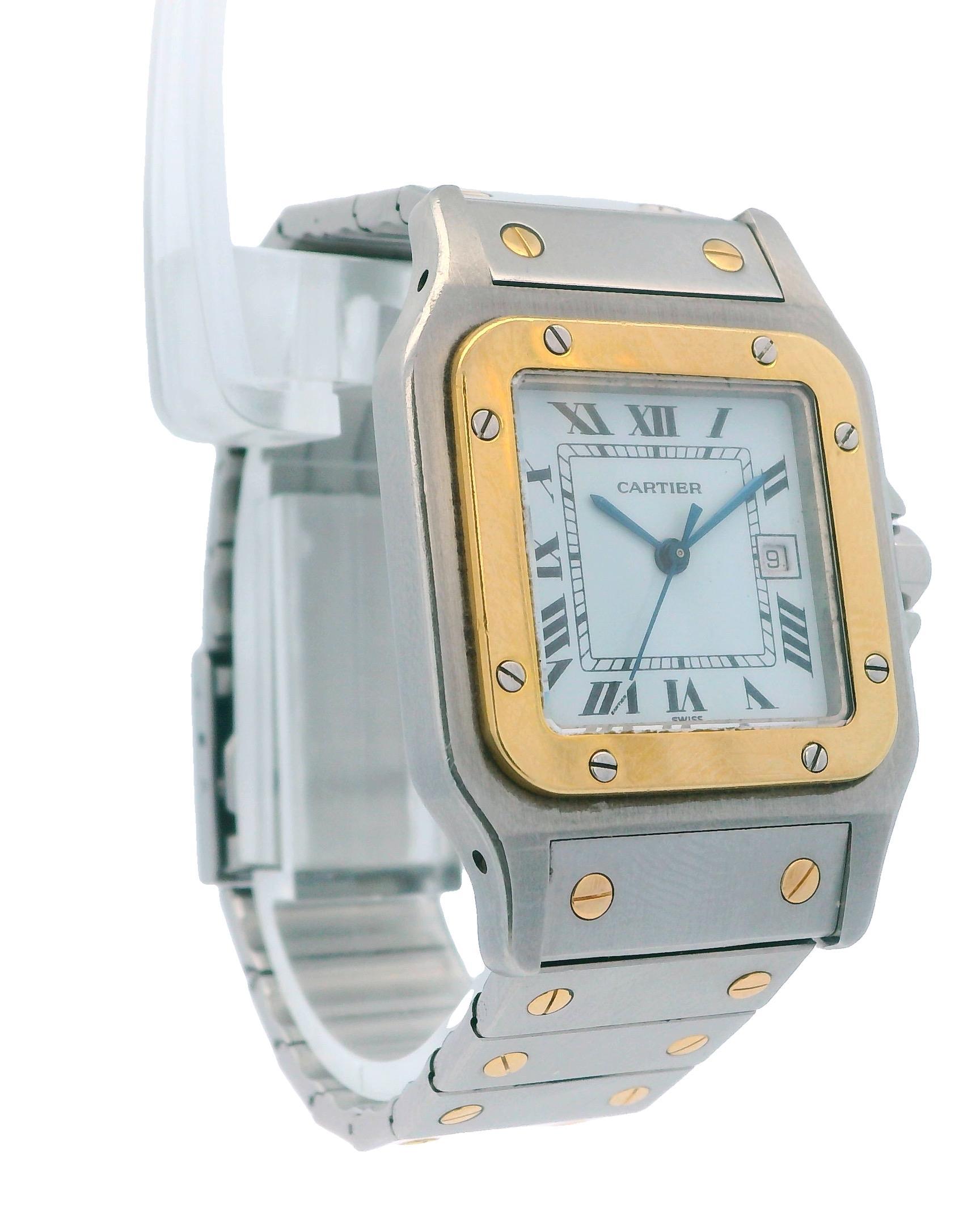 Cartier Santos de Cartier 2961 Watch. This timepiece features a 29mm stainless steel case and an 18K yellow gold fixed bezel. The off-white dial is complemented by blue hands and Roman numeral hour markers. It comes with an 18K yellow gold and
