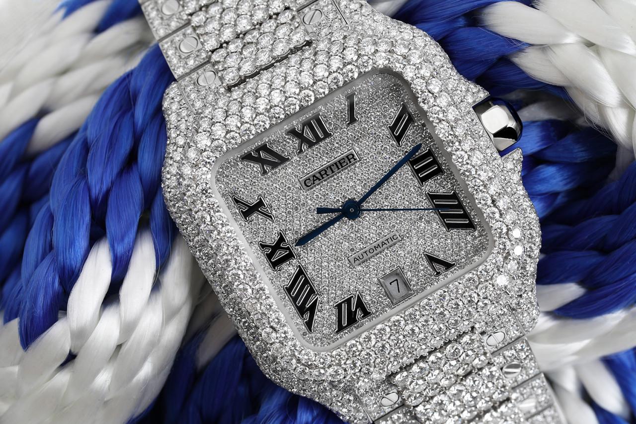 Cartier Santos De Cartier Custom Diamond Stainless Steel Watch Pave Black Roman Numeral Dial WSSA0018

Mechanical movement with automatic winding, caliber 1847 MC. Steel case, 7-sided crown set with a faceted synthetic spinel, silvered opaline dial,