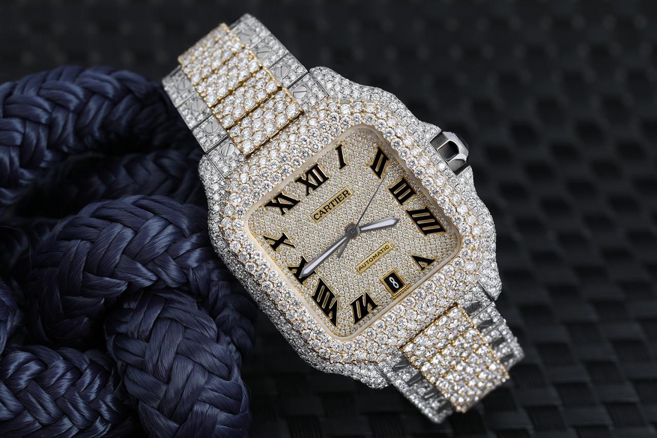 Cartier Santos De Cartier Custom Diamond Stainless Steel/ Yellow Gold Watch Pave Black Roman Numeral Dial WSSA0018

Mechanical movement with automatic winding, caliber 1847 MC. Steel case, 7-sided crown set with a faceted synthetic spinel, silvered