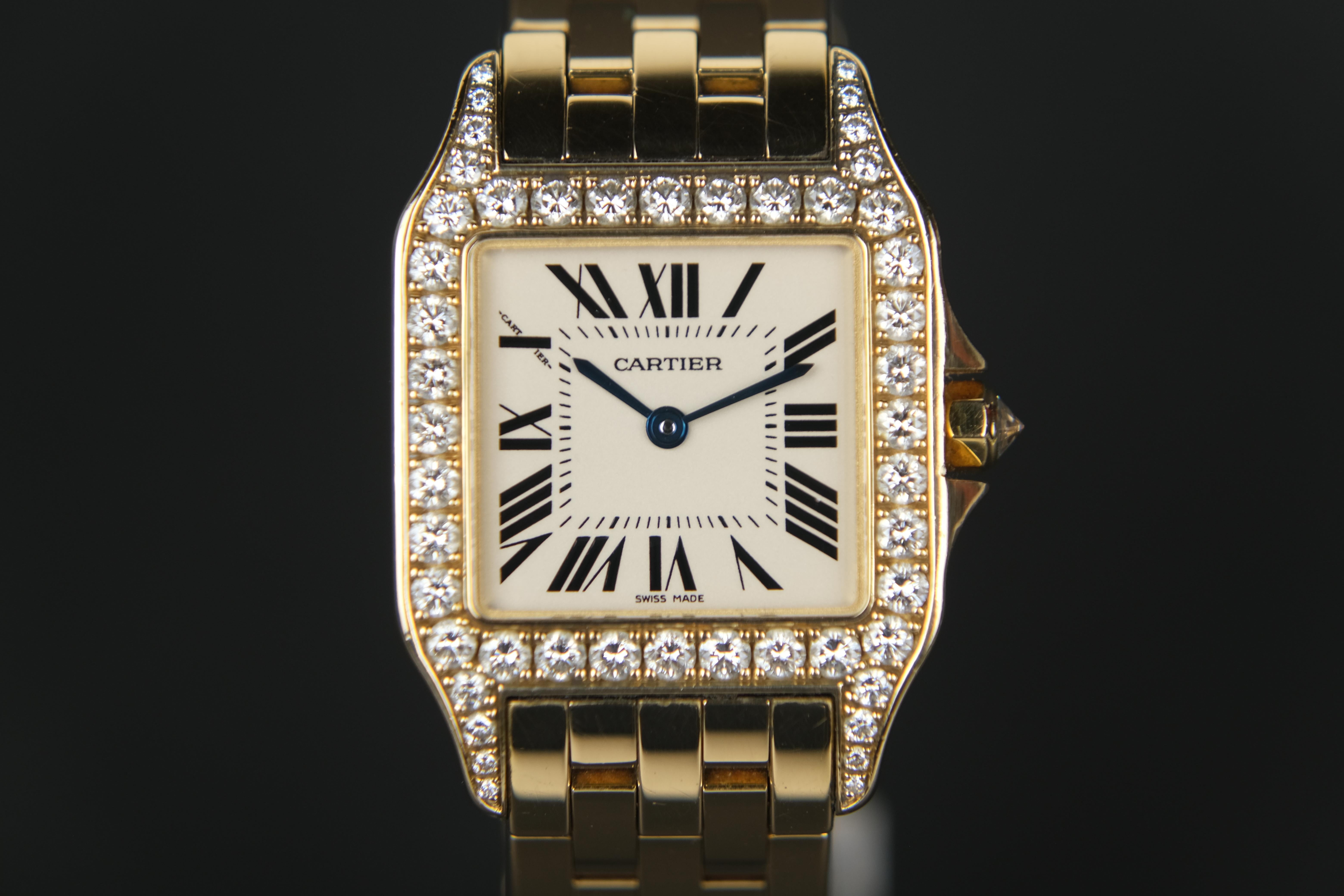 Cartier Santos Demoiselle 18K DIA

Serial Number: 294630CE
Case: 26 mm
Lug: 38 mm
Band: 20 cm
Width: 15 mm

Movement: Quartz
Case Material: Yellow Gold
Bracelet Material: Yellow Gold
Year of production: circa 2016
Condition: Good