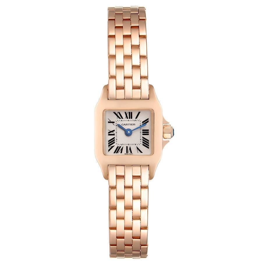 Cartier Santos Demoiselle 19mm 18k Rose Gold Ladies Watch W25077X9. Quartz movement. 18K rose gold case 18.7 x 24.0 mm. Octagonal crown set with the blue sapphire. 18K rose gold bezel. Scratch resistant sapphire crystal. Silvered grained dial with