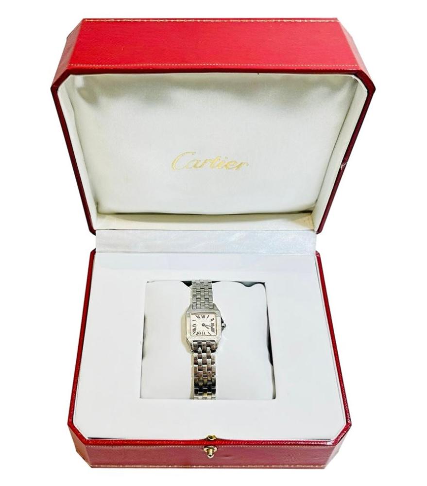 Cartier Santos Demoiselle Mother Of Pearl & Steel Watch

Swiss made watch designed with pink Mother Of Pearl dial and Roman numerals having a quartz movement.

Styled with polished stainless steel, adjustable bracelet, bezel and case, detailed with