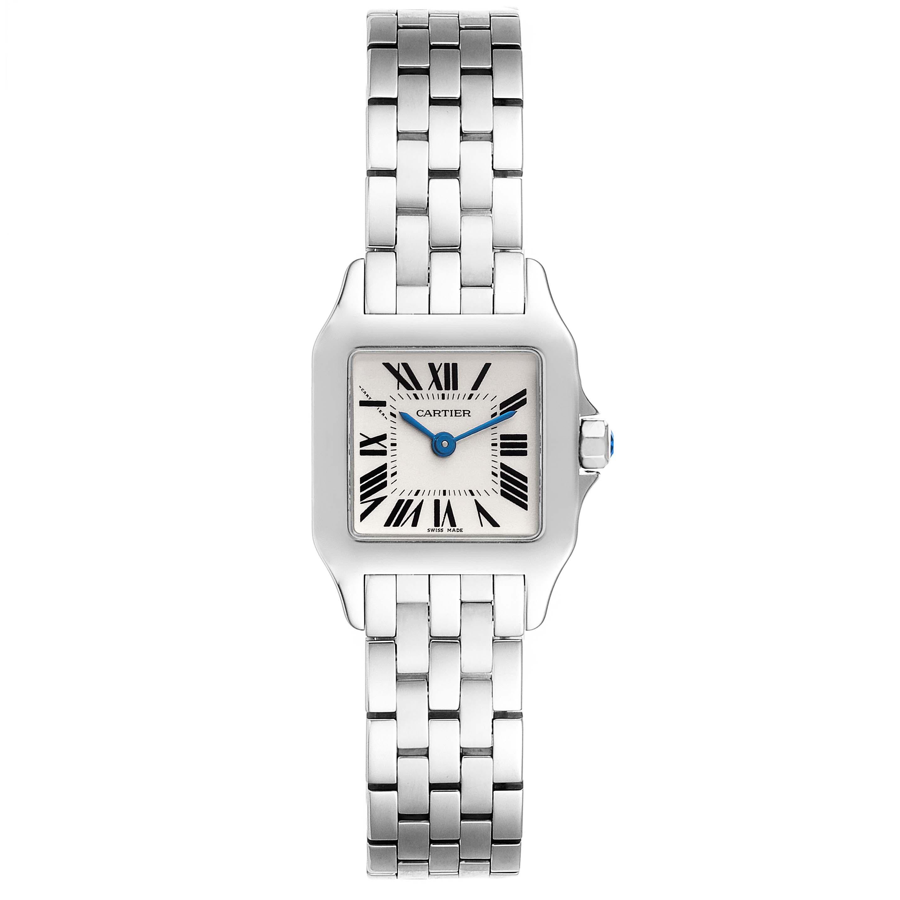 Cartier Santos Demoiselle Steel Silver Dial Ladies Watch W25064Z5. Quartz movement. Stainless steel case 20.0 x 20.0 mm. Octagonal crown set with the blue faceted spinel. . Scratch resistant sapphire crystal. Silvered grained dial. Painted black