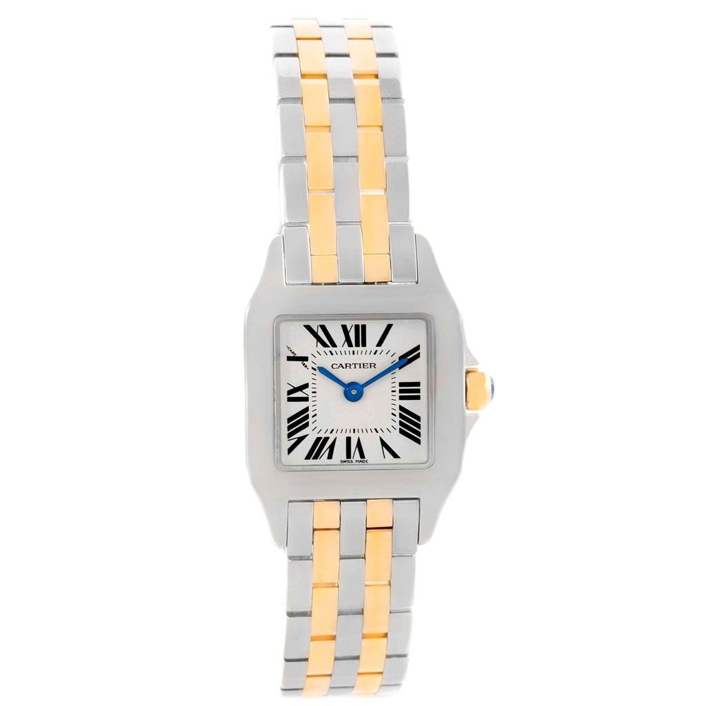 Cartier Santos Demoiselle Steel Yellow Gold Ladies Watch W25066Z6. Quartz movement. Stainless steel and 18K yellow gold case 22.0 x 22.0 mm. Octagonal crown set with the blue sapphire cabochon. Scratch resistant sapphire crystal. Silvered grained