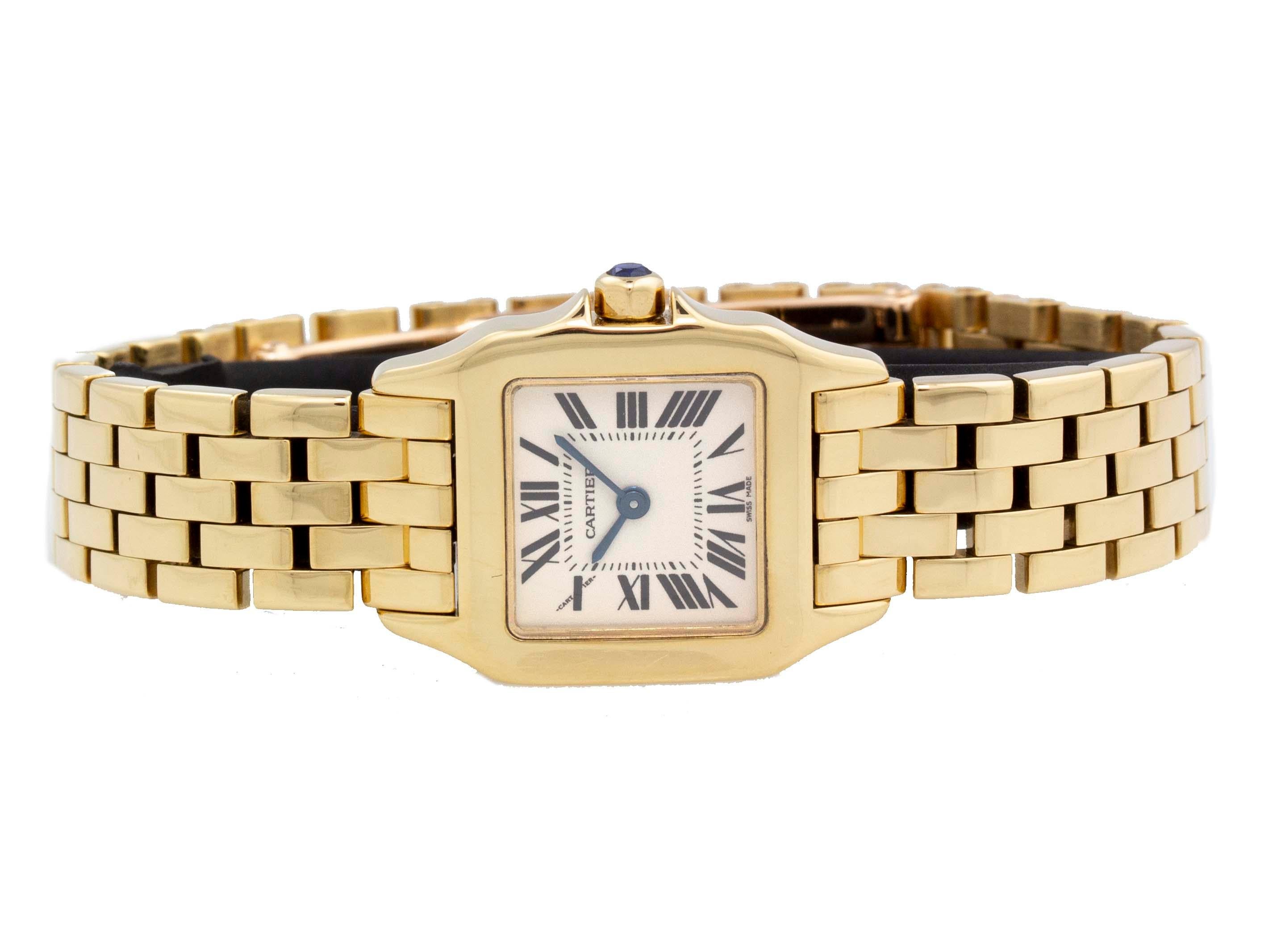 Brand	Cartier
Series	Santos Demoiselle
Model	W25063X9
Gender	Ladies
Condition	Great Condition Pre-owned, Light Scratches Throughout
Material	18k Yellow Gold
Finish	Polished
Caseback	Solid
Diameter	21mm
Thickness	 
Bezel	Fixed, 18k Yellow