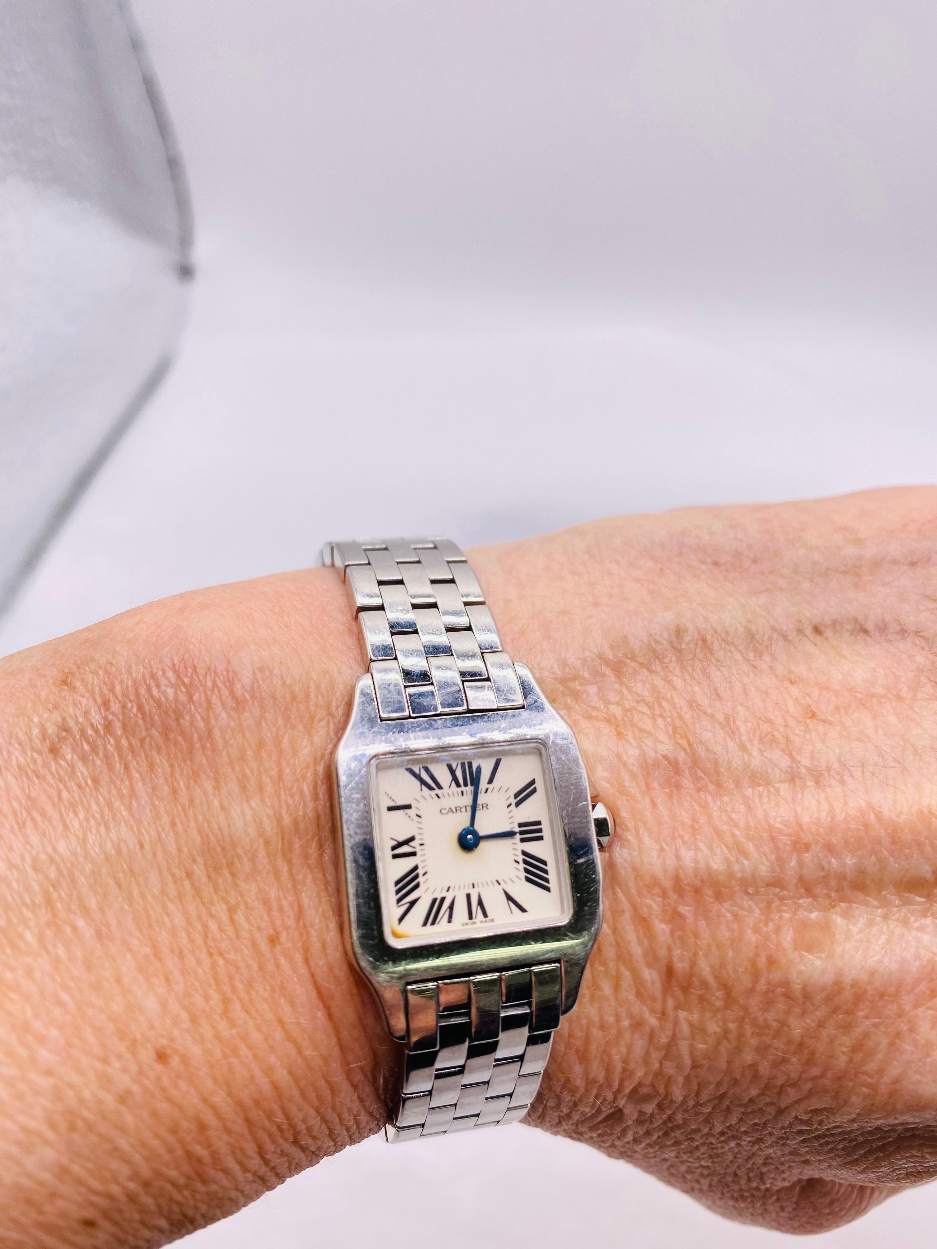 Stainless Steel Cartier Santos Demoiselle Serial: 717406lx, Model: 2698 Professionally Serviced: 8/10/21. 10mm wide band. 20x20mm square case.