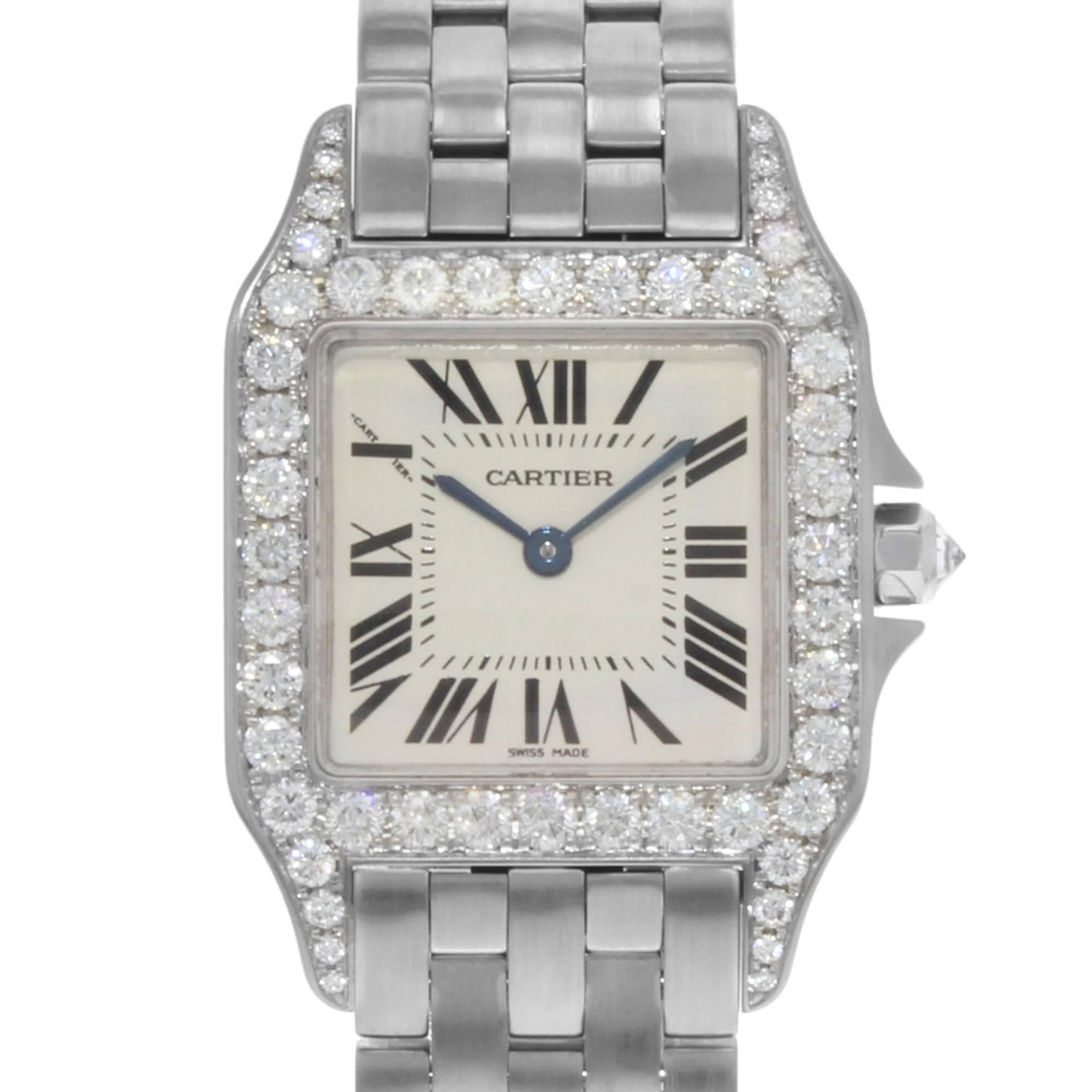 This pre-owned Cartier Santos WF9004Y8 is a beautiful Ladies timepiece that is powered by a quartz movement which is cased in a white gold case. It has a square shape face, no features dial and has hand roman numerals style markers. It is completed
